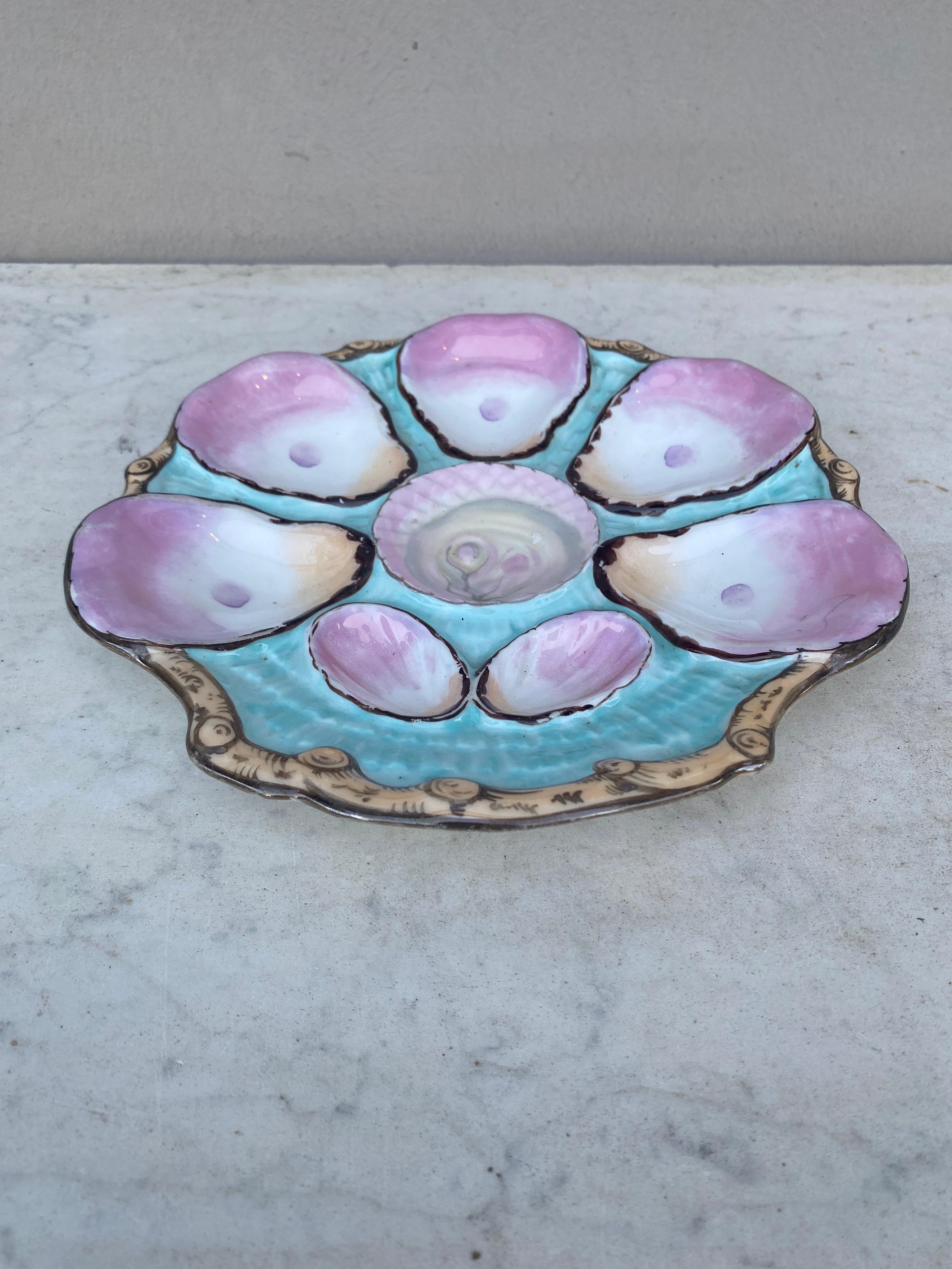 Lovely pastel colors porcelain oyster plate signed C.T Carl Tielsch.