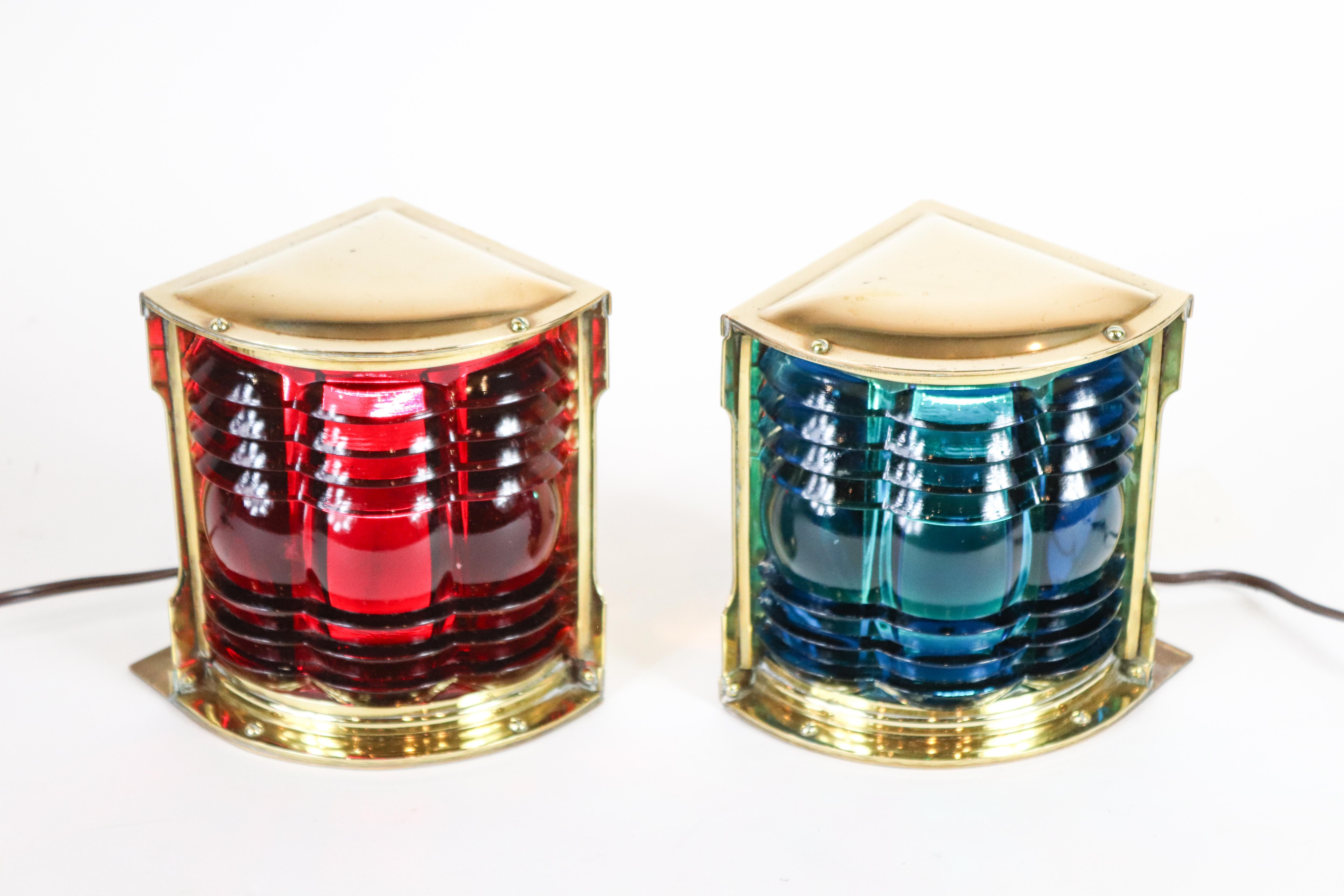 Rare port and starboard lanterns with Fresnel red and blue/green lenses. Brass cases. Electrified. 6.5 x 6 x 5.5.