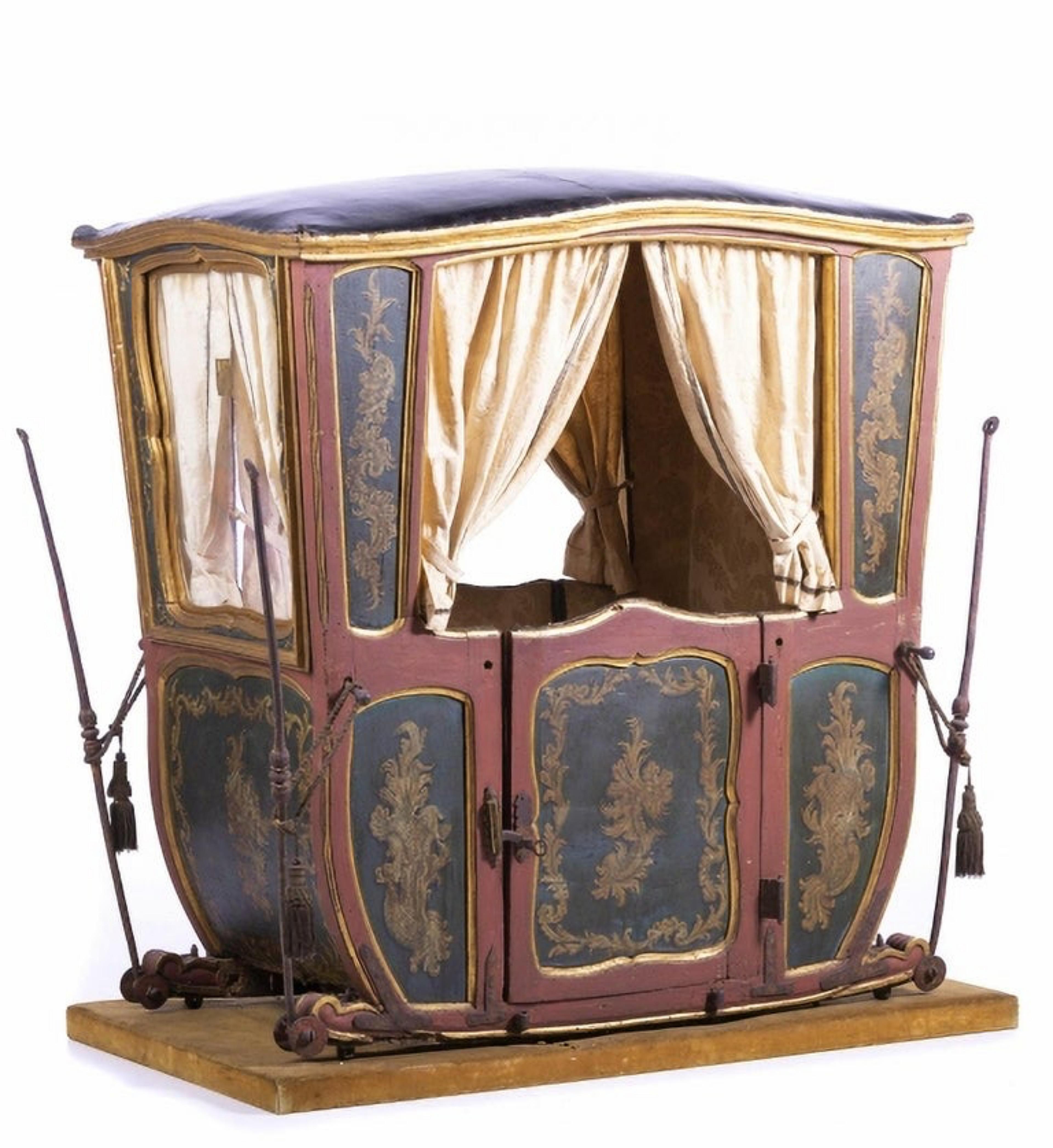 Sedan chair for 2 people

Portuguese 18th century
in carved, painted and gilded wood, fabric-lined interior, leather cover.
Restorations, failures and defects
Dimension: 142 x 136 x 42 cm
Good condition in general.