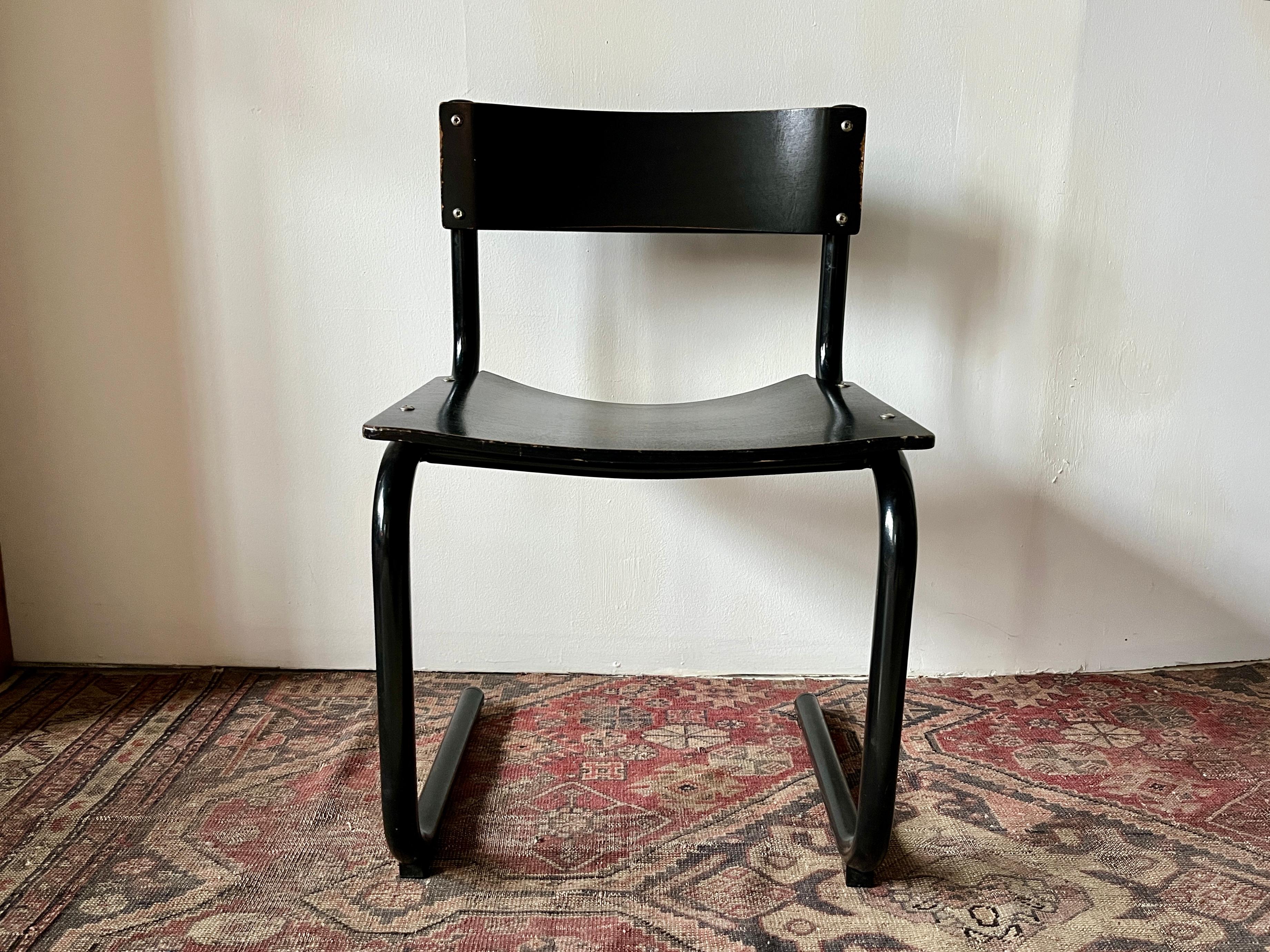 Black painted bentwood and tubular steel cantilevered chair made by Randers Mobelfabrik in Denmark -- for the offices of Kroin in Cambridge, Massachusetts in the early 1980s. Kroin is a manufactuer and distributer of park and garden furniture, and