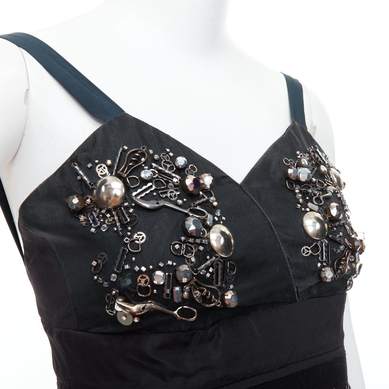rare PRADA 2006 Runway grey silk fur bolts embellished dress IT40 S
Reference: TGAS/E00412
Brand: Prada
Designer: Miuccia Prada
Collection: AW 2006 - Runway
Material: Fabric, Fur
Color: Grey, Brown
Pattern: Animal Print
Closure: Zip
Lining: Black