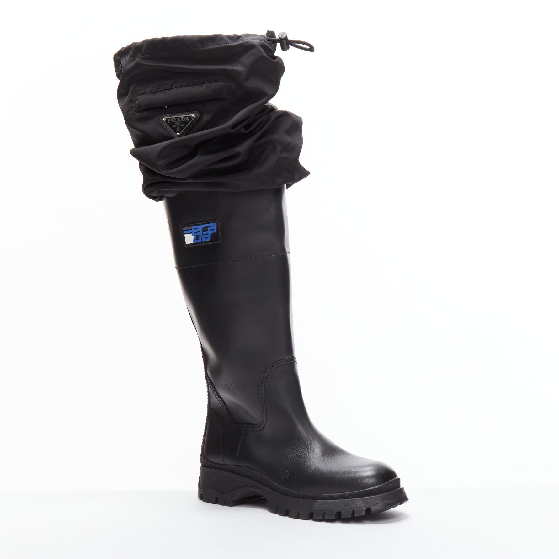 rare PRADA 2009 Runway Gaiter black leather nylon thigh high boots EU38
Reference: TGAS/D00657
Brand: Prada
Designer: Miuccia Prada
Collection: FW 2009 - Runway
Material: Leather, Fabric
Color: Black, Blue
Pattern: Solid
Closure: Slip On
Lining: