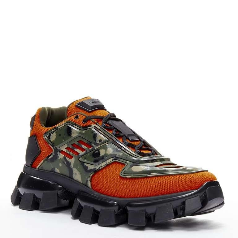 rare PRADA Cloudbust Thunder Runway orange green camo sneaker UK9.5 EU43.5
Reference: TGAS/C01526
Brand: Prada
Designer: Miuccia Prada
Model: Thunder Cloudbust
Collection: Runway
Material: Fabric, Rubber
Color: Orange, Green
Pattern: Solid
Closure: