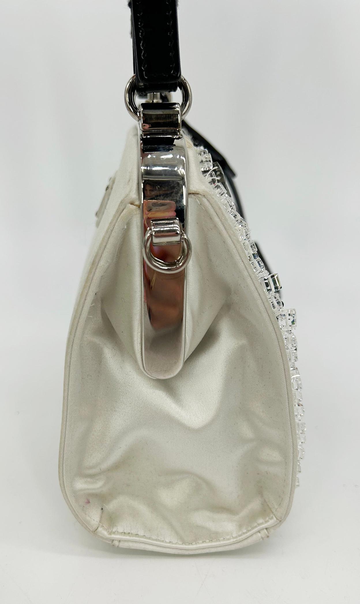 RARE Prada Raso Ricamo White Silk Crystal Beaded Frame Bag in fair condition. White satin silk exterior body trimmed with silver hardware, black patent leather and multicolor crystal beaded embroidery along front side. Top button closure opens via