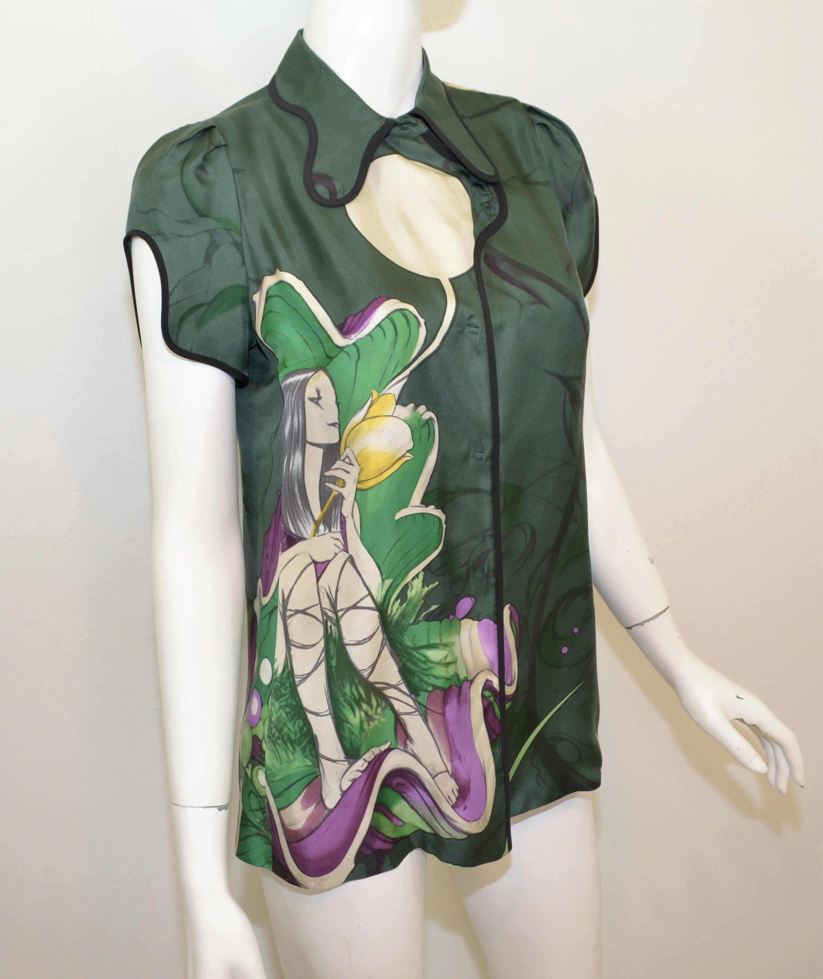 Prada printed silk blouse by artist James Jean, Taiwanese American visual artist, in collaboration with Prada featured in green with a unique fairy print, cap sleeves and snap button fastenings. 100% silk, size 42, made in Italy.

Measurements:
Bust
