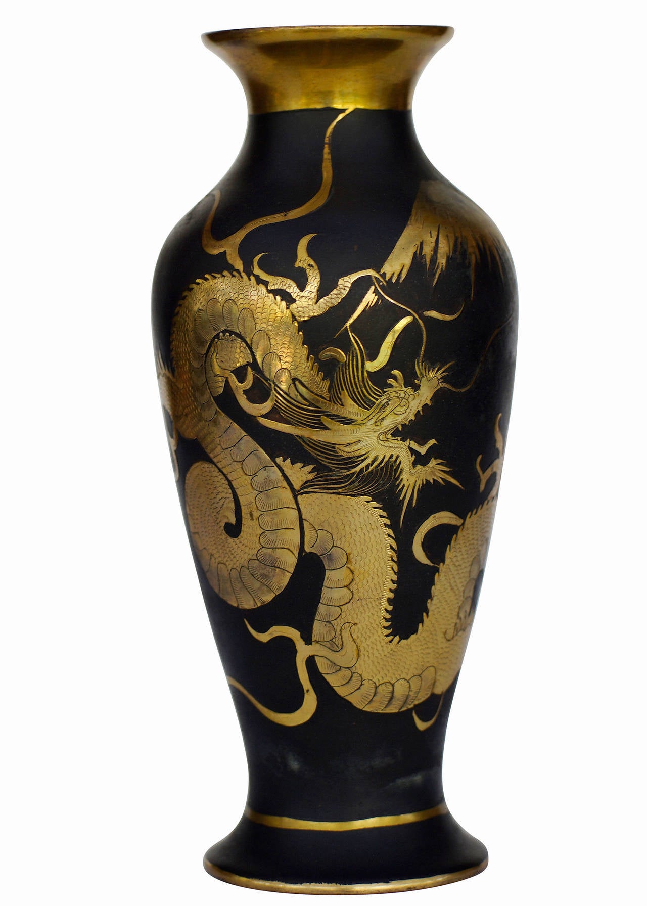 This Japanese damascene dragon vase, pair, made circa 1920-1930 with 24-karat gold inlay features a far eastern dragon wrapping around the face of the vase. The workmanship in the inlay is excellent.

Due to the numerous family-run boutiques that