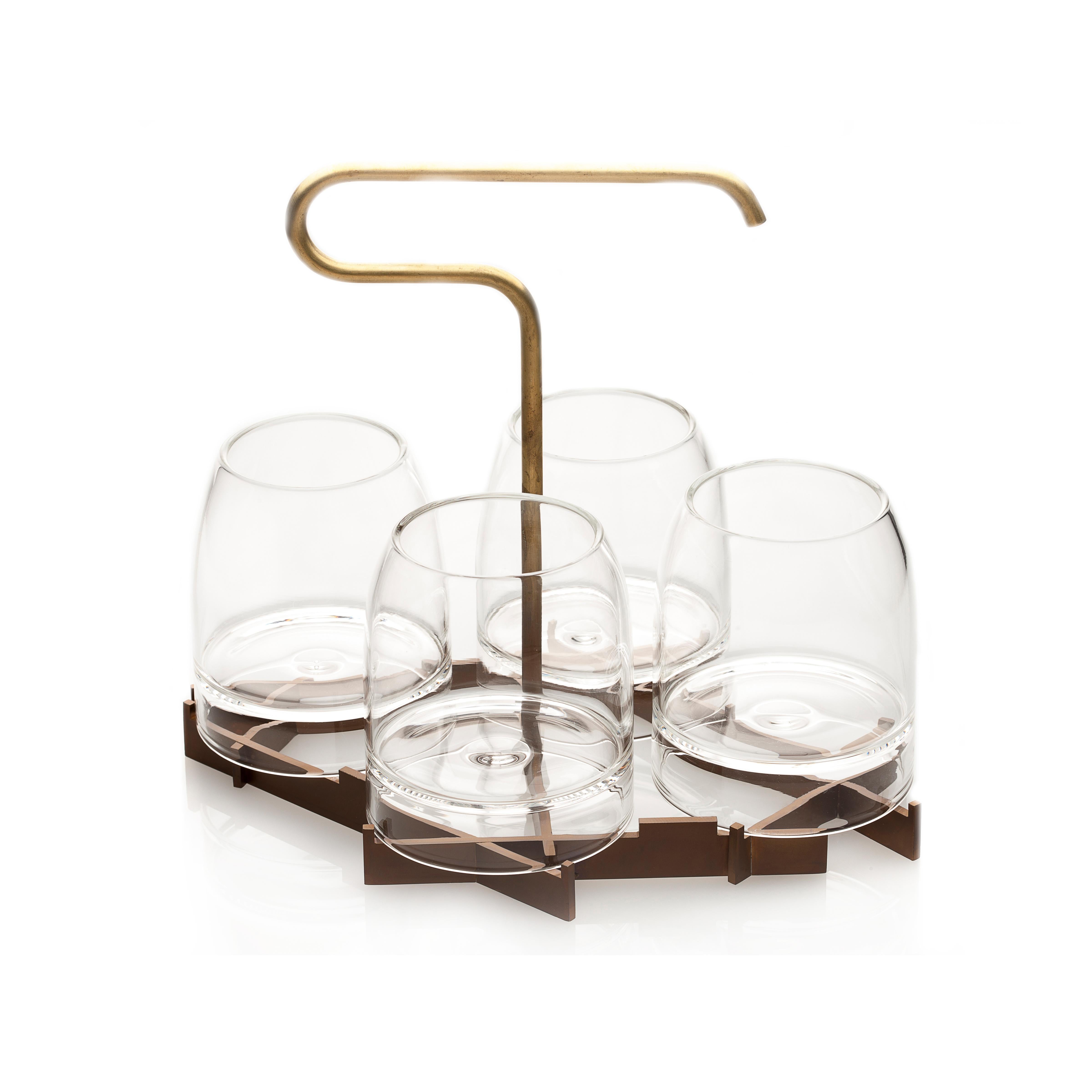 Includes one rare presenter and four rare whiskey glasses

Inspired by the pleasures of fine whisky, the rare presenter, by gentner design, elevates the experience through the art of presentation. The suspended tray with a unique handle allows it