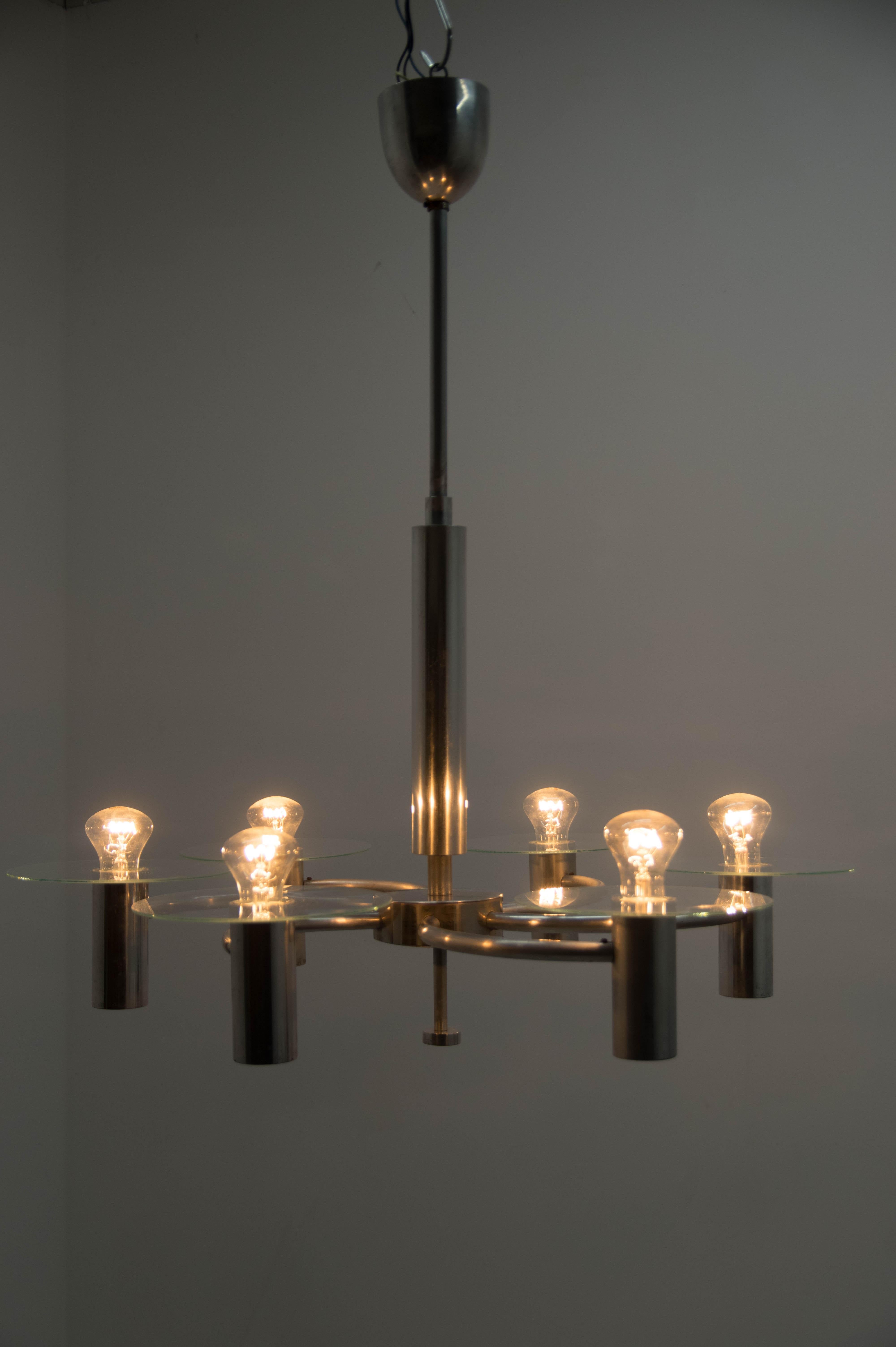 Rare Machine Age chandelier influenced by aircraft propeller.
Two separate circuits, new wiring, 6 x 60W, E27 or E26 bulbs
Minor loses on the inner hole of the glass shades are not visible when assembled.