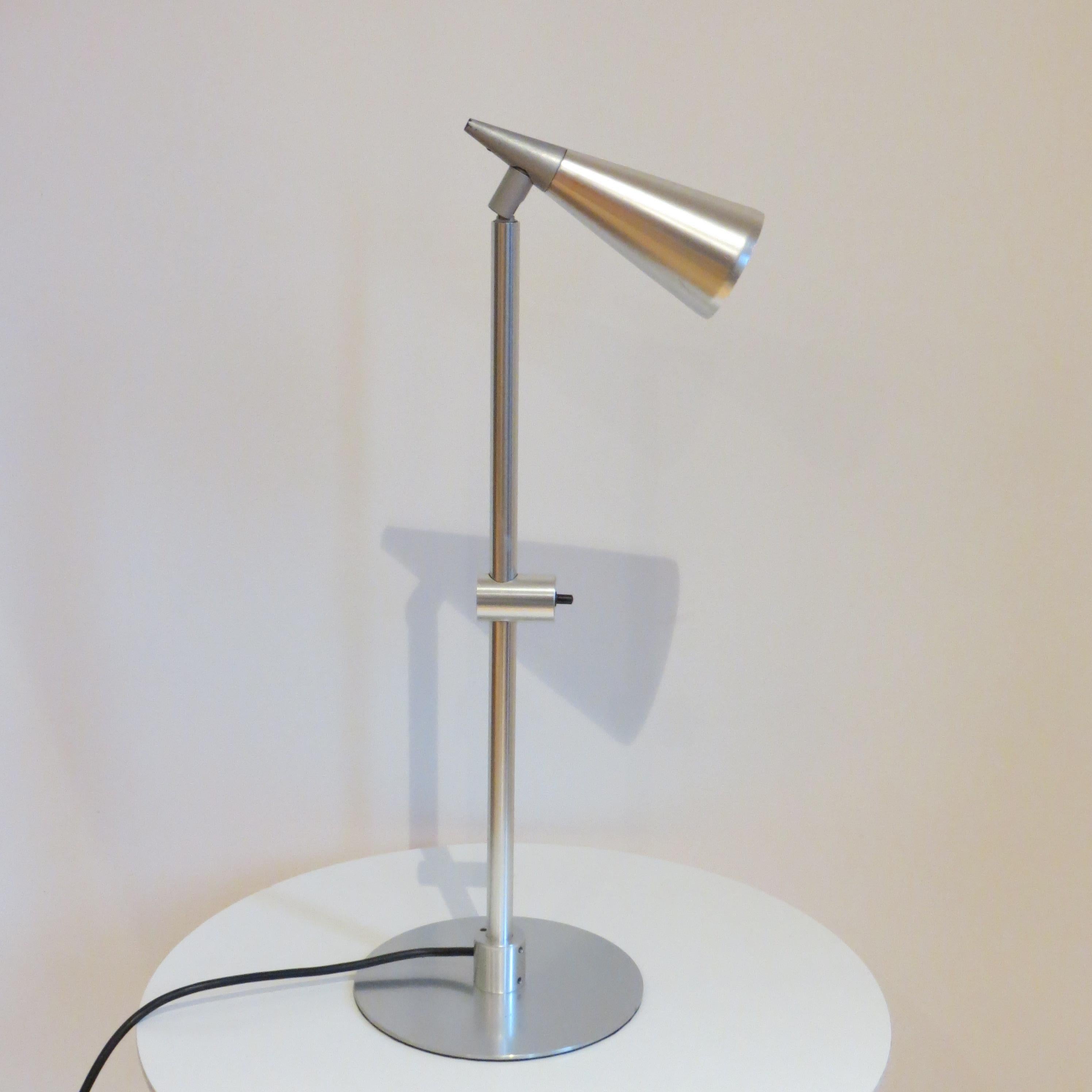 Very rare unique desk lamp  This is a prototype lamp - a one off - designed by Peter Nelson and manufactured by Architectural Lighting Ltd.  
A beautiful, very good quality, well engineered lamp made from aluminium with a billet aluminium switch
