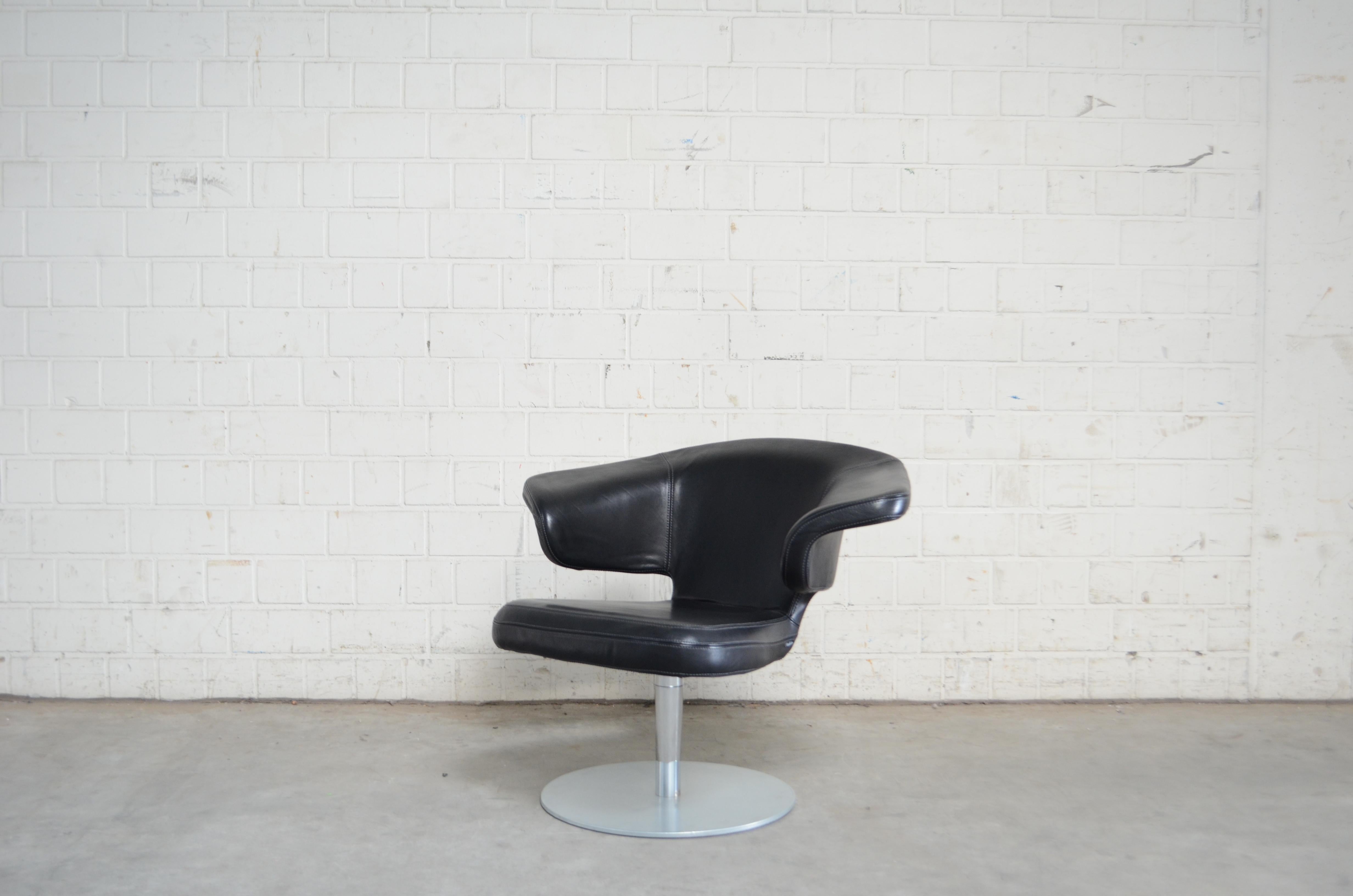 Model Munich lounge chair designed by Sauerbruch & Hutton. 
Manufactured by Classicon.
This object is a rare and unique prototype with a metal swivel base that never was available on the market.
Black aniline leather with grey stitches.