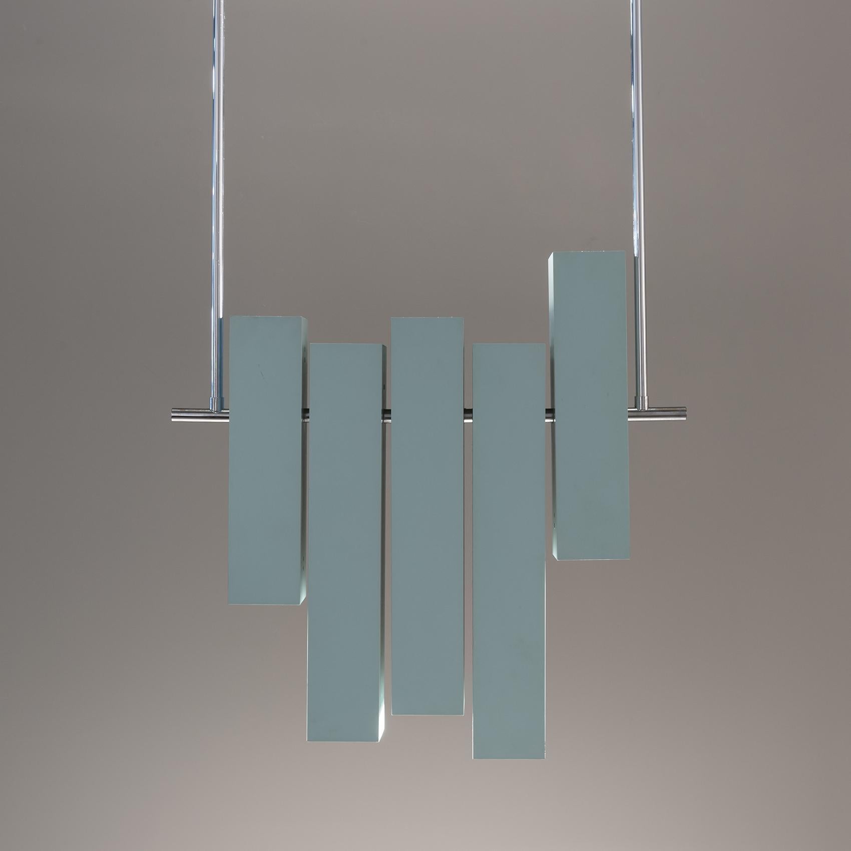 Rare prototype created by Di Bernardo, an italian architect, for Lumi Italia.

Pendant lamp created in the 1970s for an interior architecture project in Milan, the pendant light was never manufactured. A very geometric lamp, it is composed of