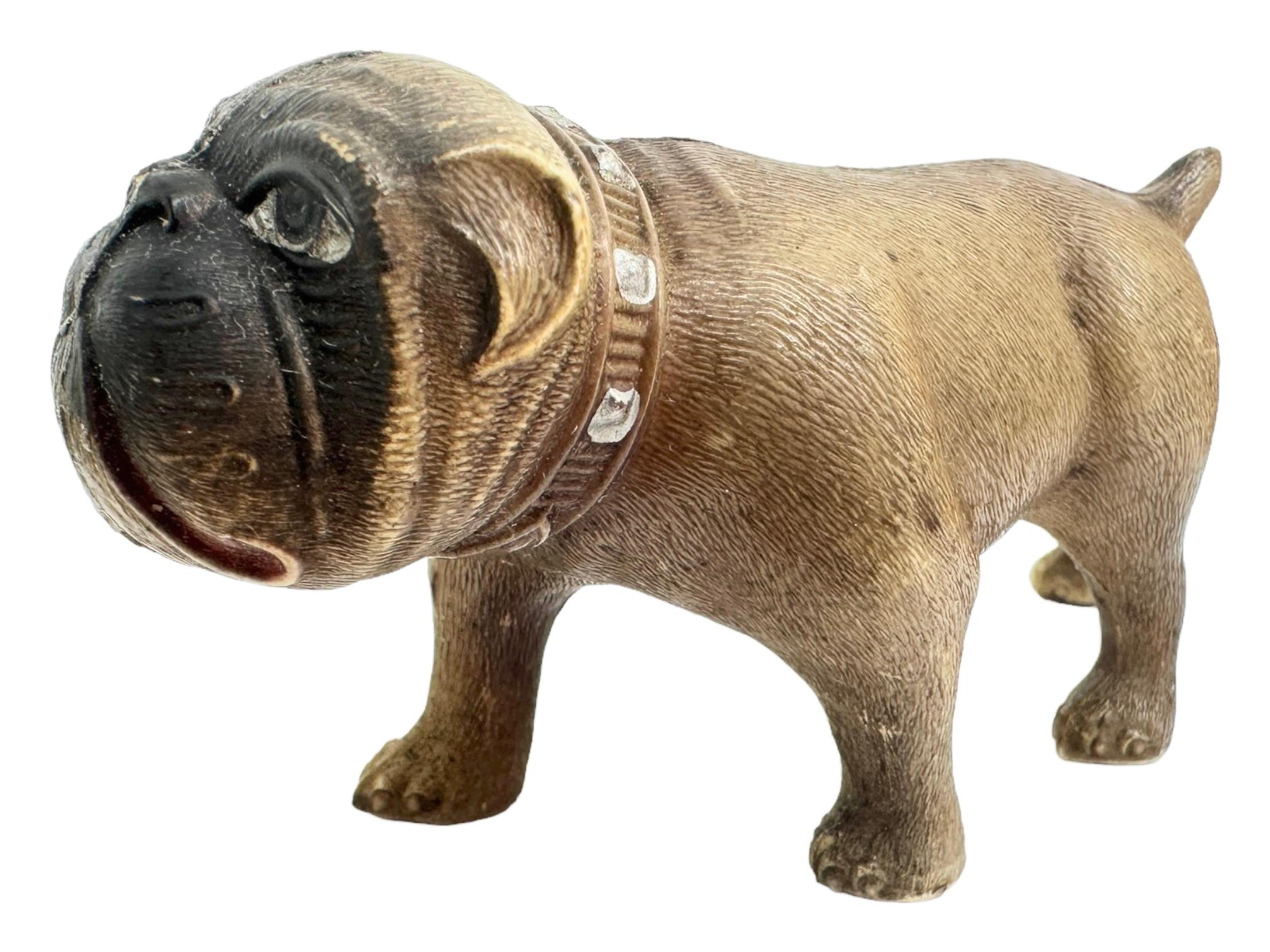 A rare pug or bulldog Figurine bought in Austria. It is made of Celluloid and very delicate, this would be a great addition for your Toy or Bulldog collection. It is in nice condition for this age, and has miner imperfections, but as you can see in