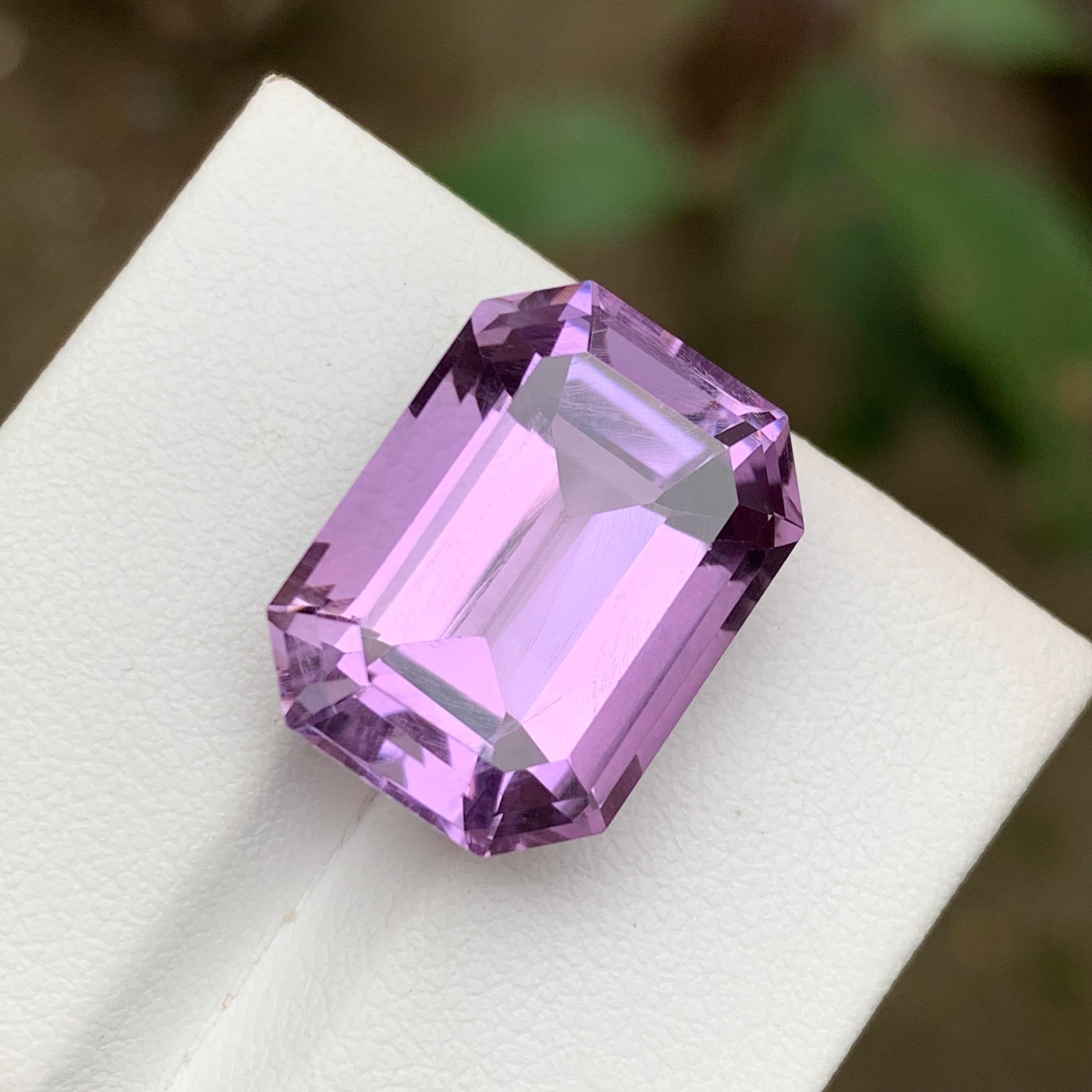 GEMSTONE TYPE: Amethyst 
PIECE(S): 1
WEIGHT: 17.05 Carats
SHAPE: Step Emerald Cut
SIZE (MM): 17.65 x 13.02 x 10.44
COLOR: Purple
CLARITY: Eye Clean
TREATMENT: None
ORIGIN: Africa
CERTIFICATE: On demand
(if you require a certificate, kindly request