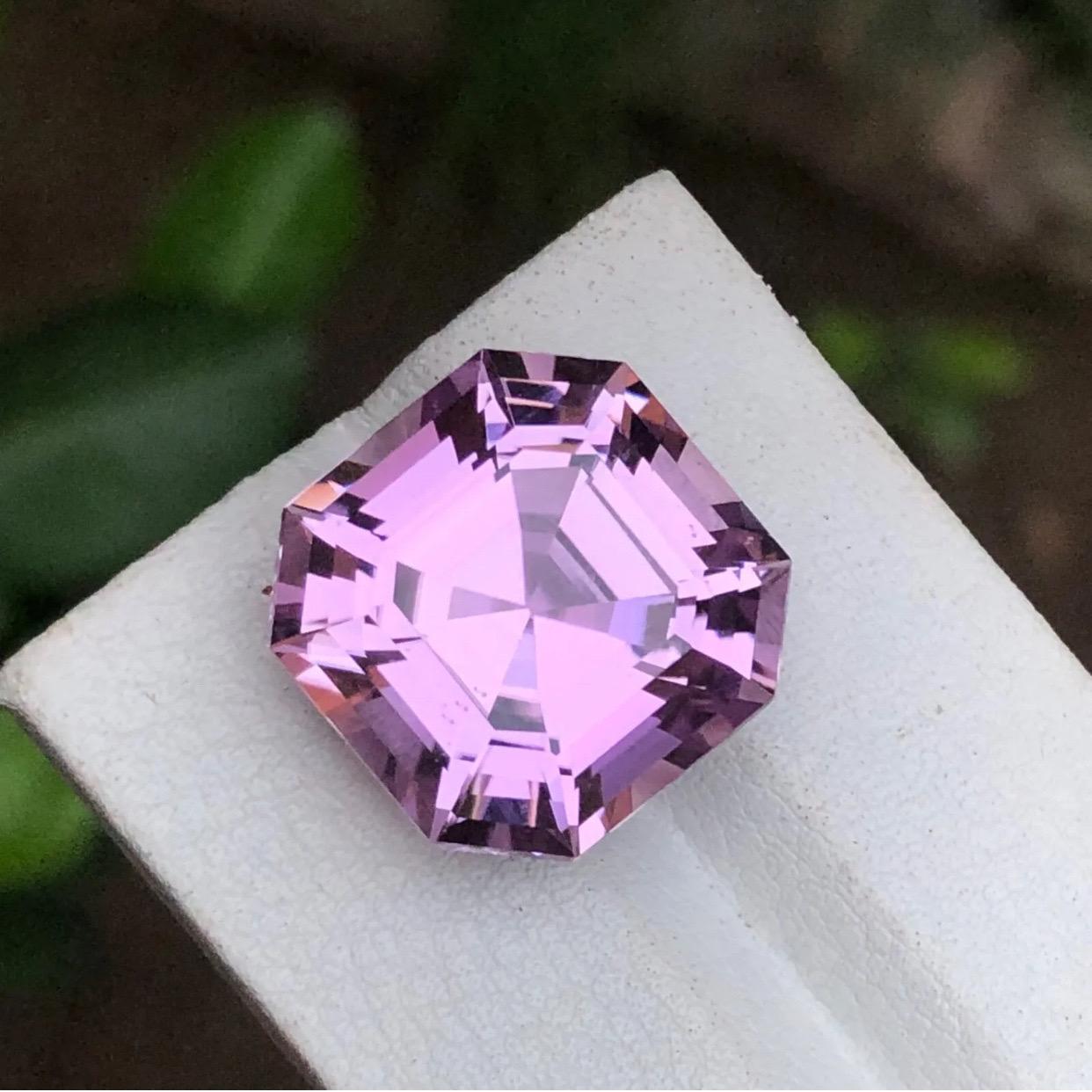Gemstone Type: Kunzite
Weight: 20.75 Carats
Dimensions: 16.33 x 16.33 x 11.08
Color: Purple, Lavender
Clarity: Eye Clean
Treatment: Heated
Origin: Afghanistan
Certificate: On demand 

Behold the epitome of elegance and allure – a mesmerizing 20.75