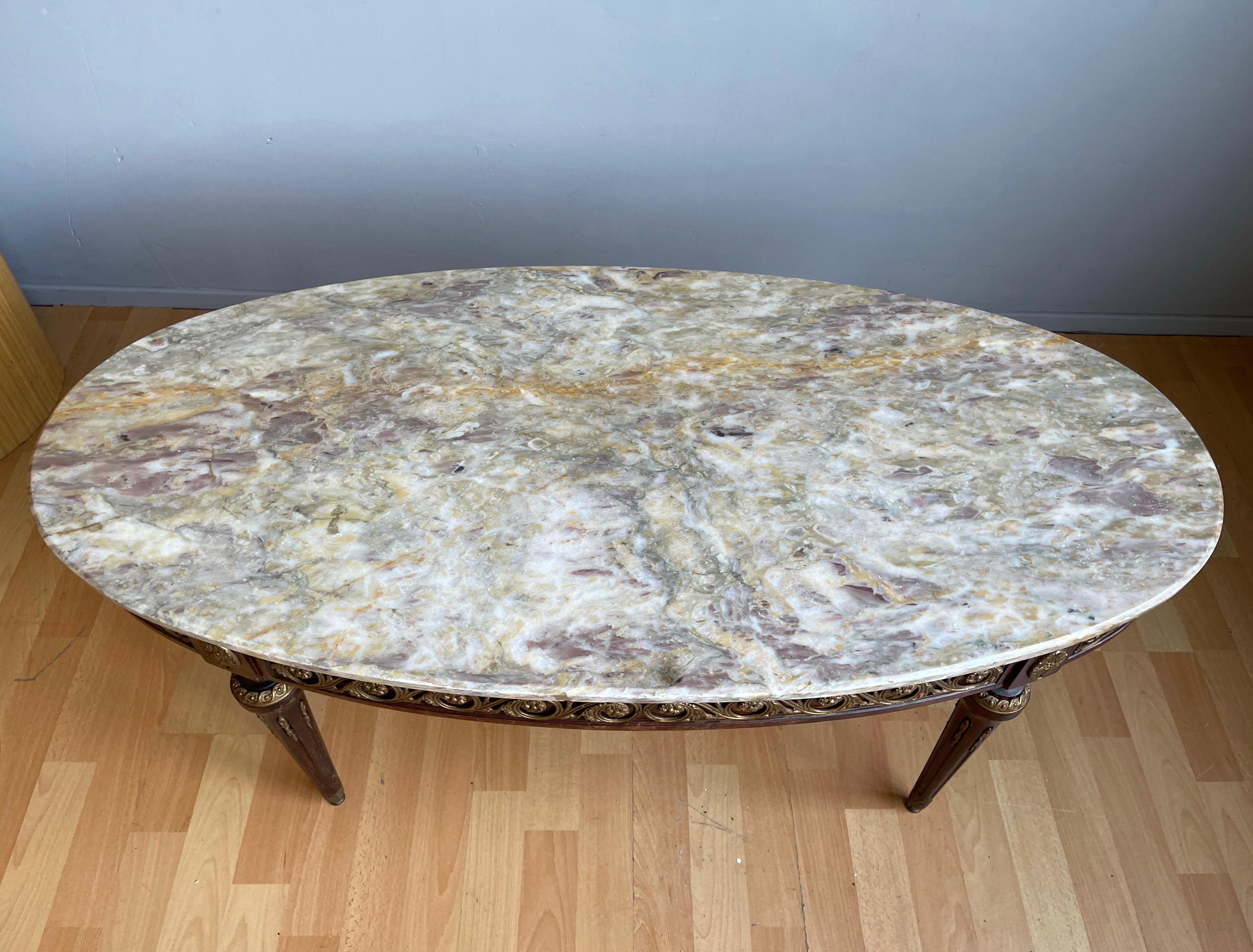Midcentury made, excellent quality French coffee table .

If you are searching for a stylish, beautifully made and highly decorative coffee table then this French specimen could be just what you are looking for. This typically French, Louis Seize