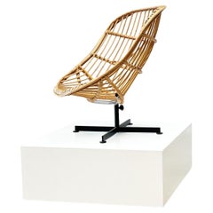 Rare rattan lounge chair by Rudolf Wolf for Rohe