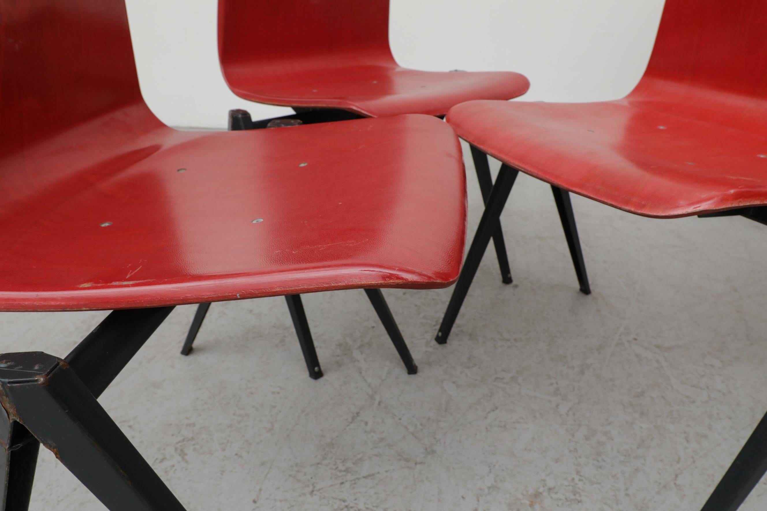 Rare Red Prouve Style Stacking Chairs with Dark Metal Compass Legs For Sale 10