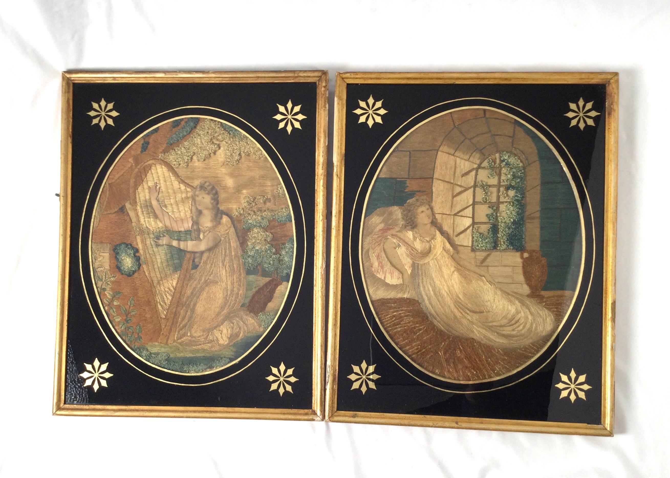 Pair of rare Regency Period embroidered and hand painted silk mourning pictures. Black and gold reverse painted glass. Extremely fine well detailed silks. One embroidery features a woman playing a harp the other a maiden lounging. Good age
