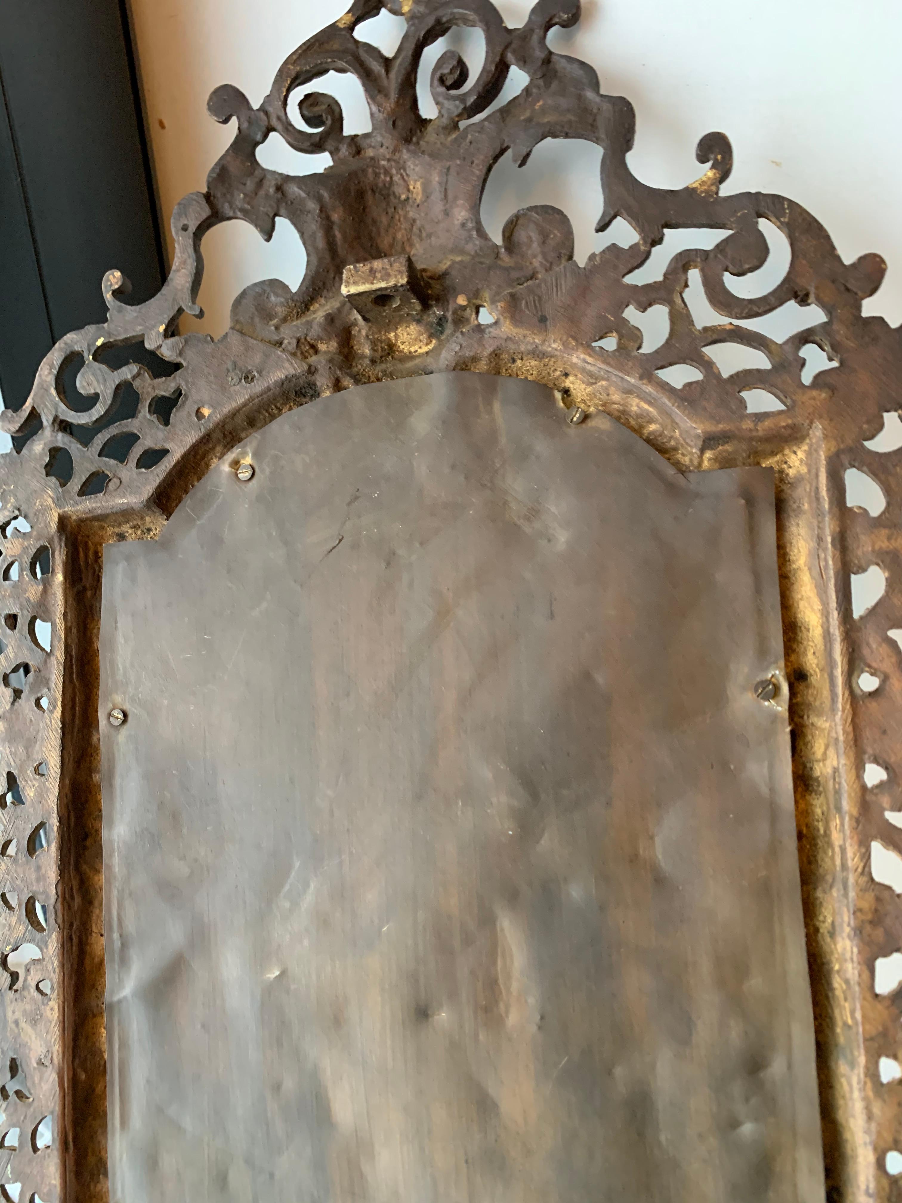 Rare Renaissance Revival Bronze Wall Mirror with Candelabras and Stunning Masks For Sale 8