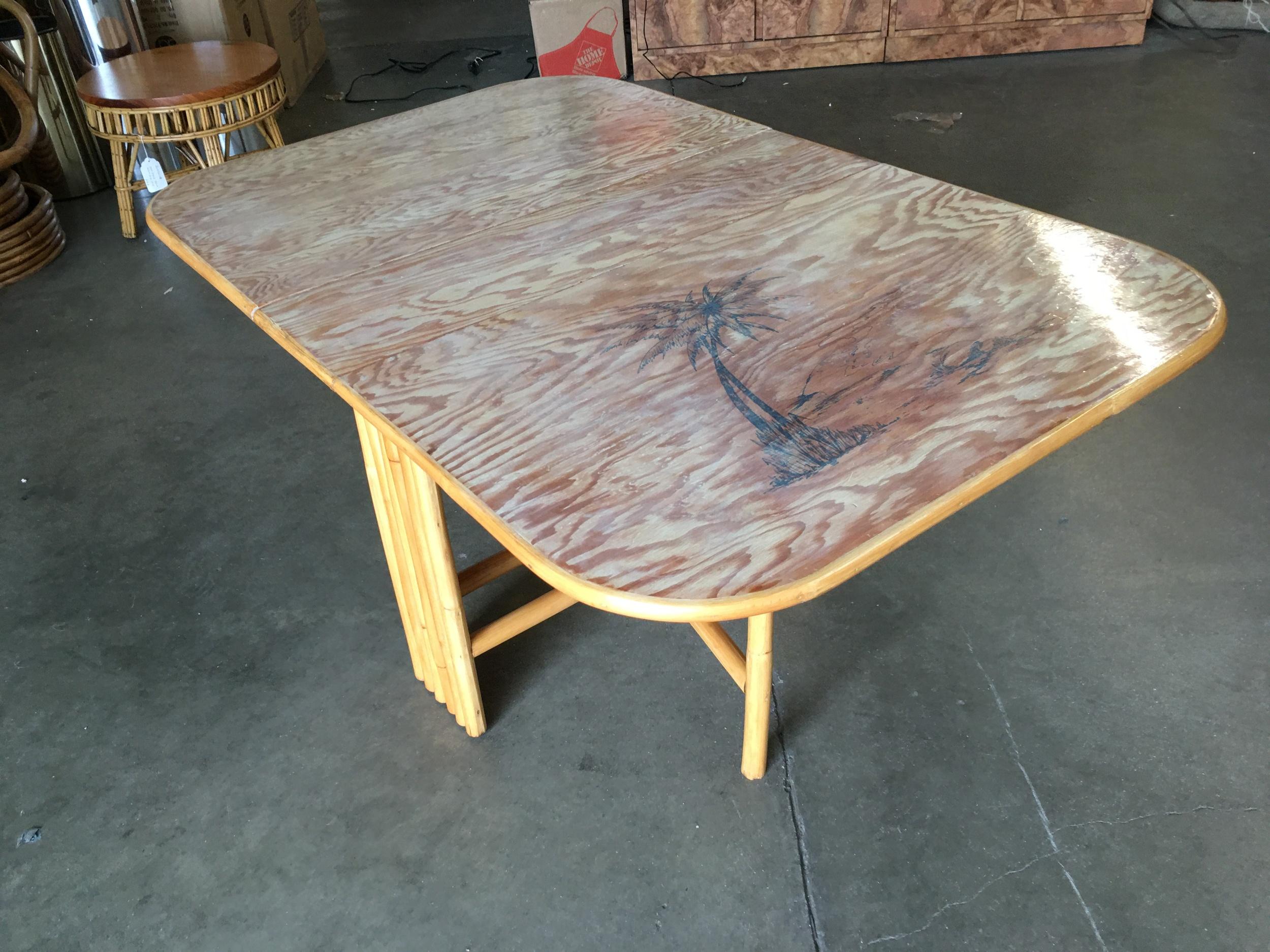 Very rare restored gateleg dining table with screen printed plywood top. 

The table folds in two directions for easy storage.

Size: Open 24