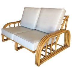 Rare canapé en rotin à trois brins de Paul Laszlo, restauré et de qualité muséale.