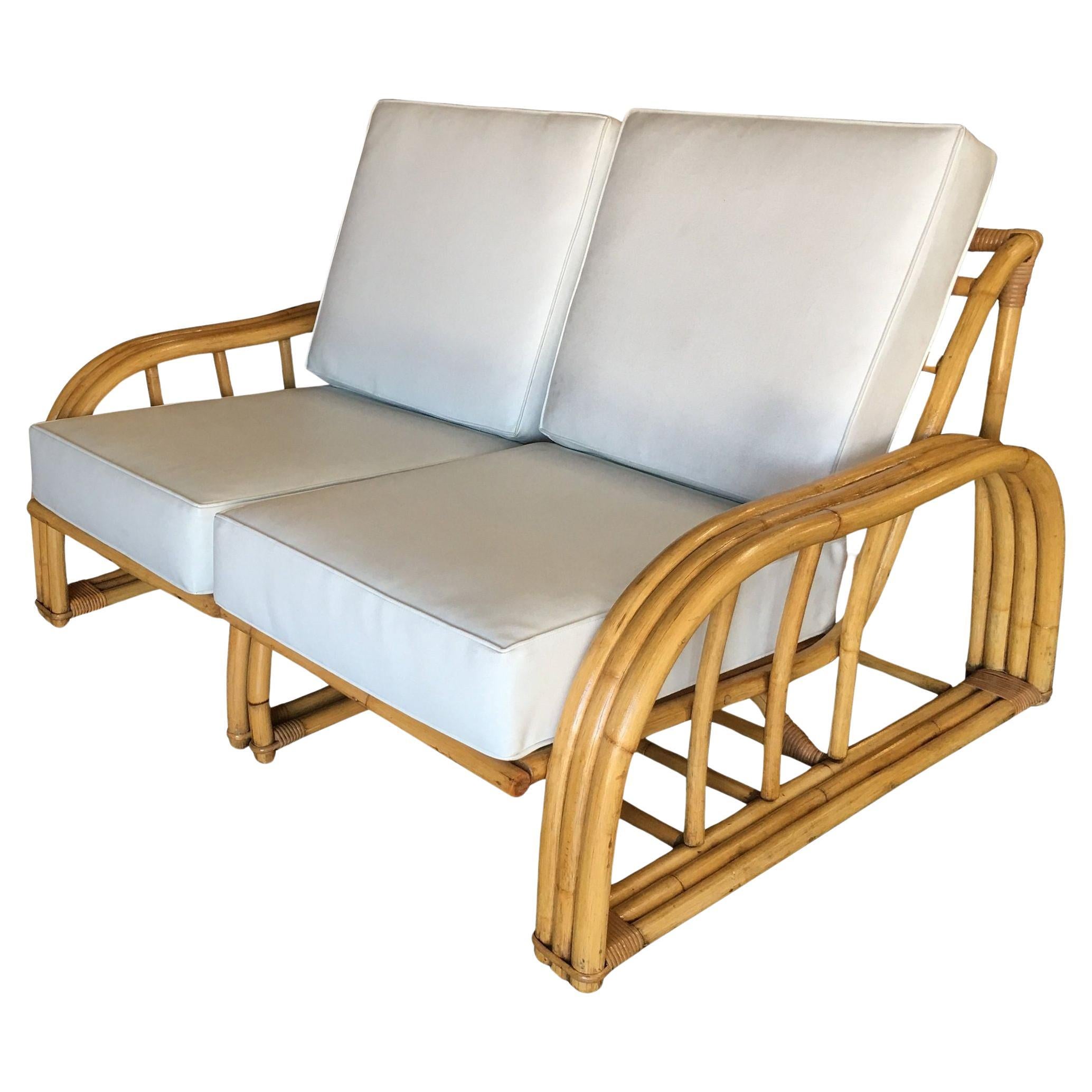 Rare Restored Museum Quality Paul Laszlo Arched 3-Strand Rattan Settee For Sale