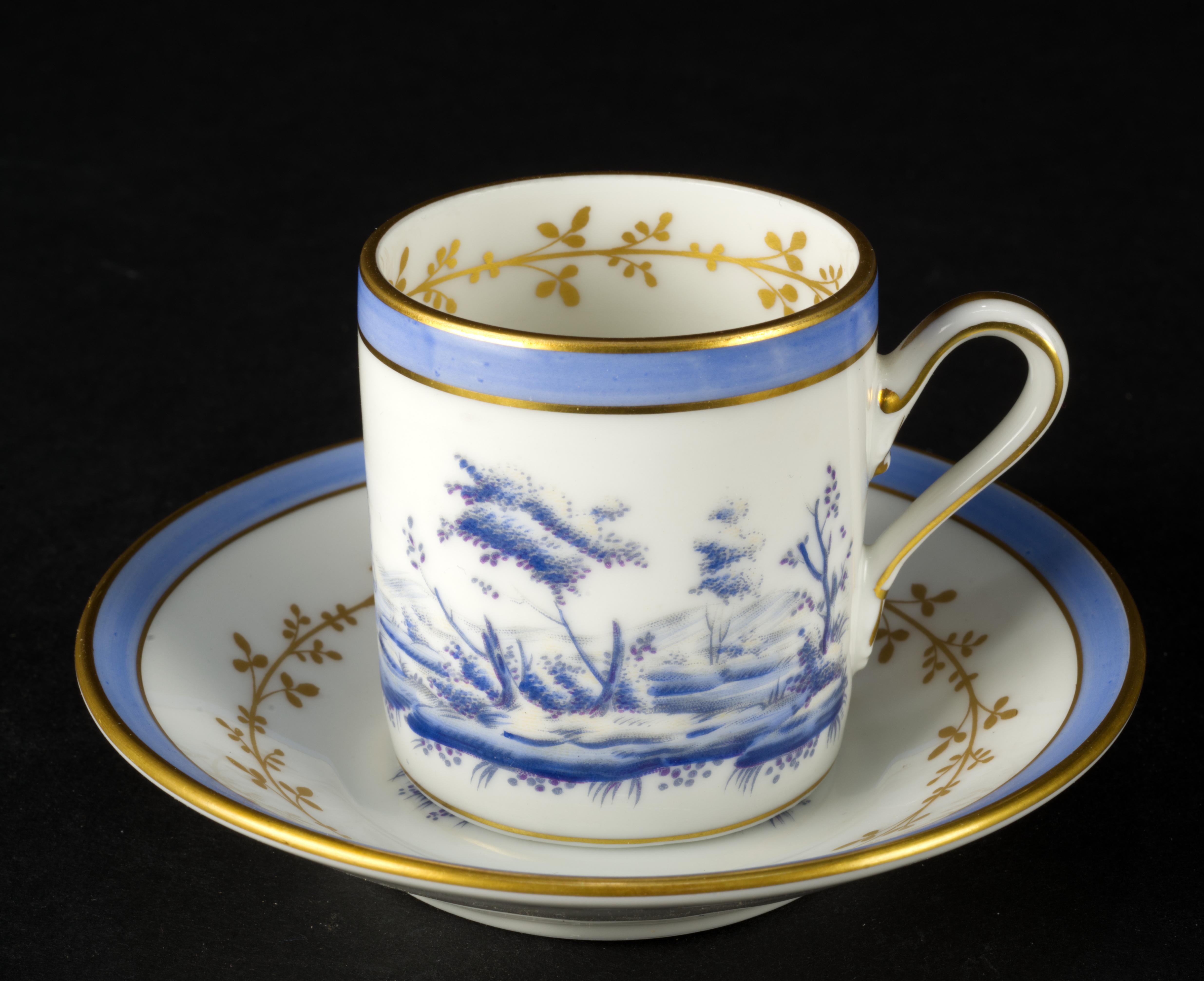  Rare Richard Ginori demitasse or espresso cup and saucer set was made of fine semi-translucent porcelain in Italy. It is decorated with traditional landscape done in different shades of blue on white background with gold and light blue rim. Gold
