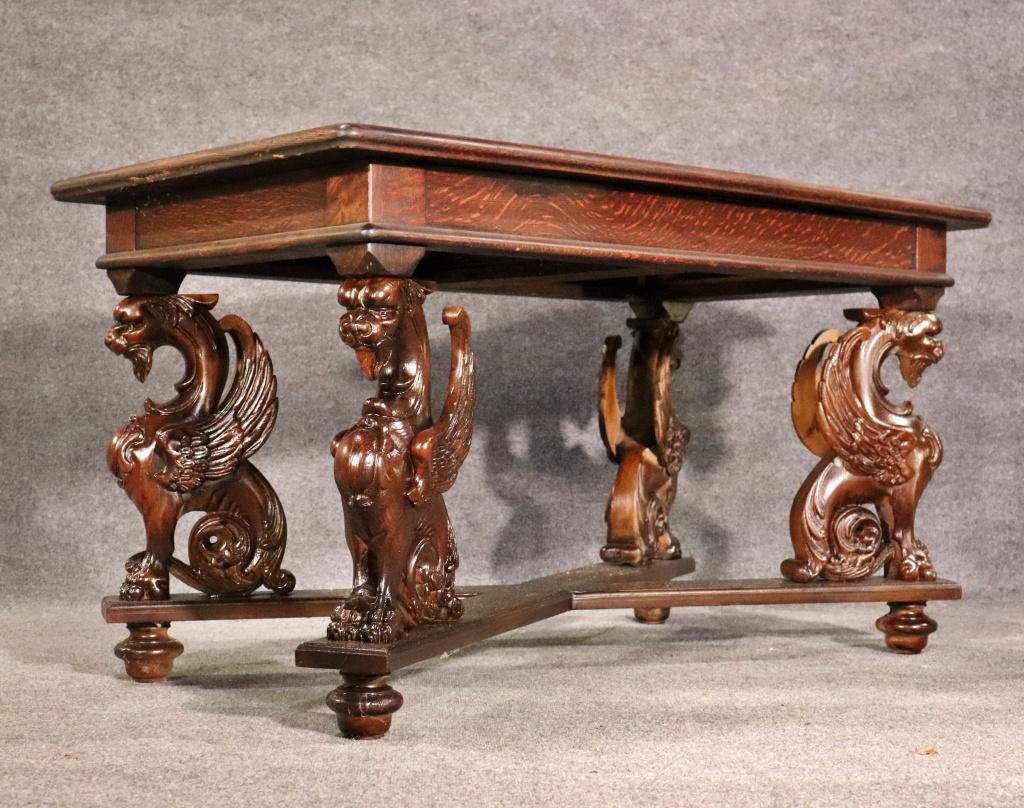 High Victorian Rare RJ Horner Style Carved Winged Griffin Oak Library Writing Table Circa 1870