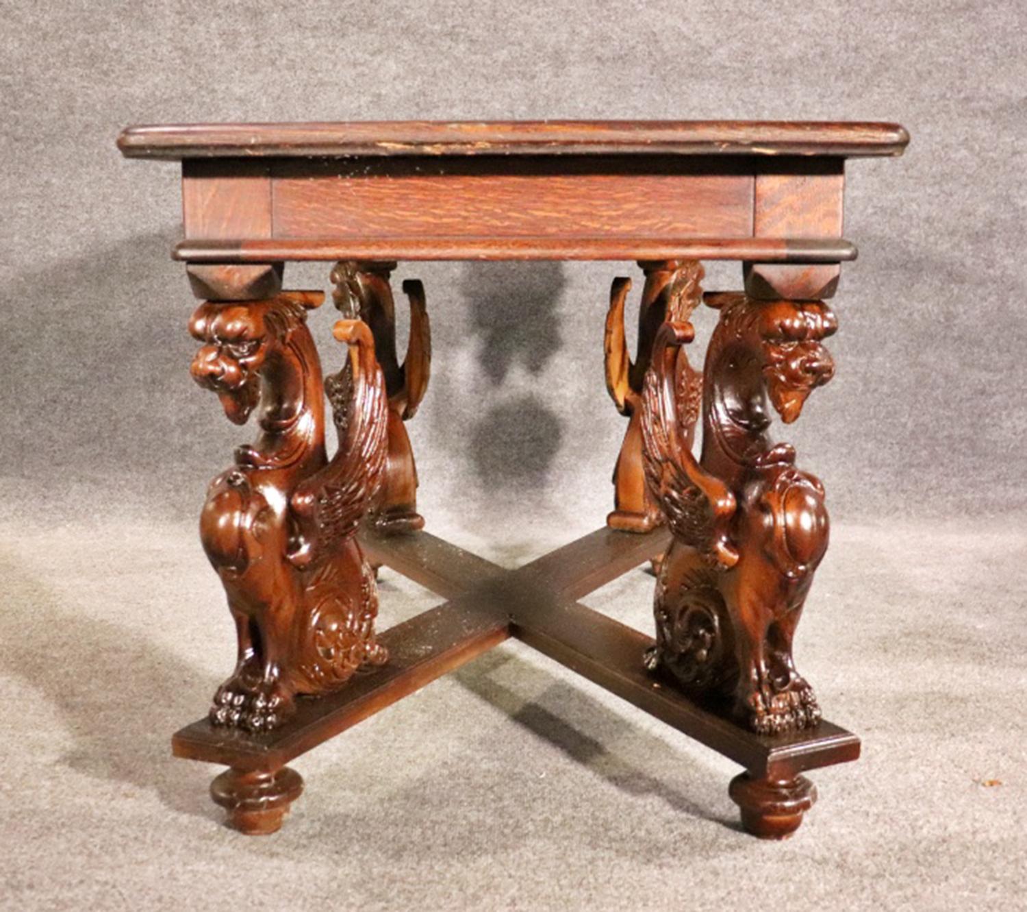 Late 19th Century Rare RJ Horner Style Carved Winged Griffin Oak Library Writing Table Circa 1870