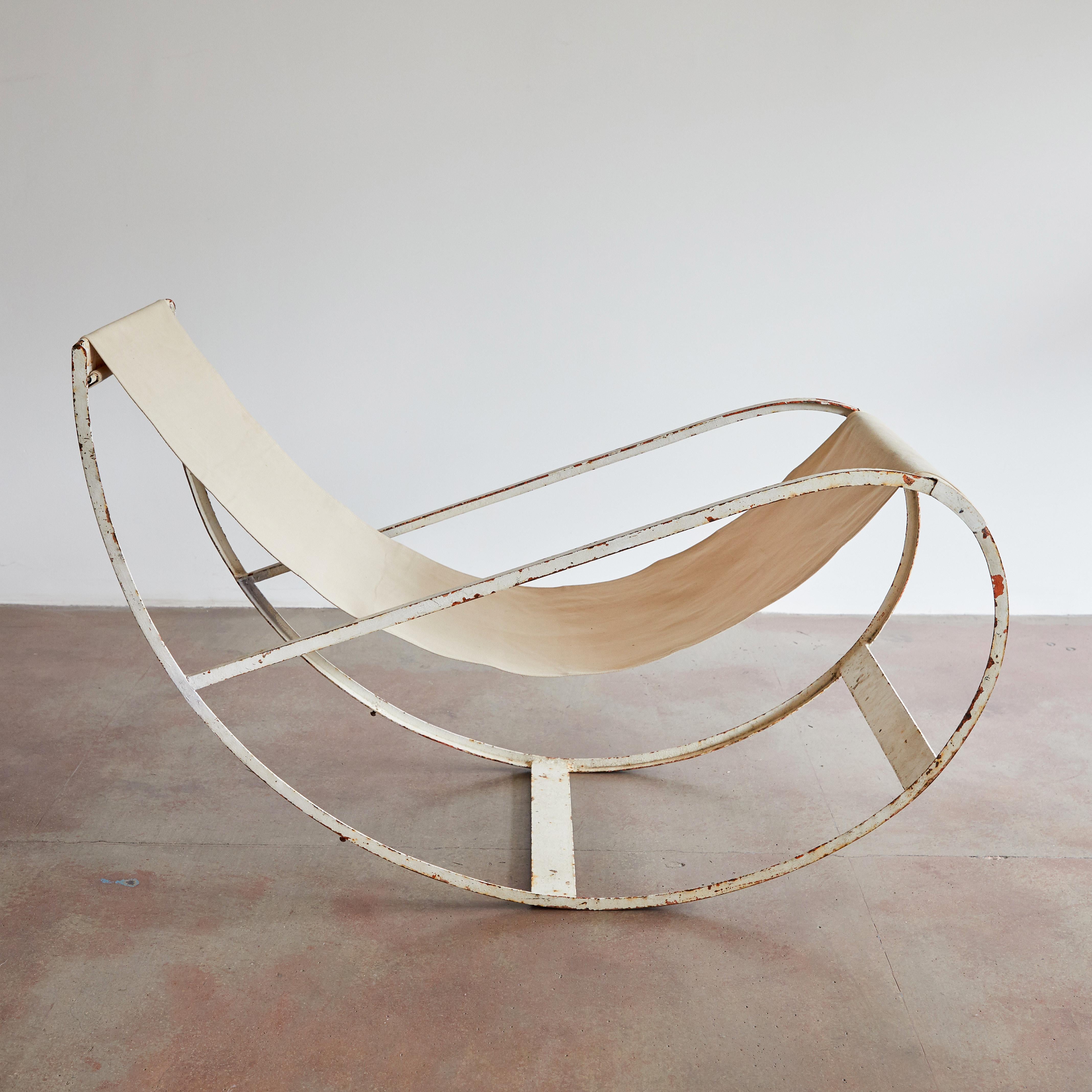 Rare painted metal rocking chair with canvas sling by François Turpin. Made in France circa 1930s.

Bibliography: Pierre Migennes, 