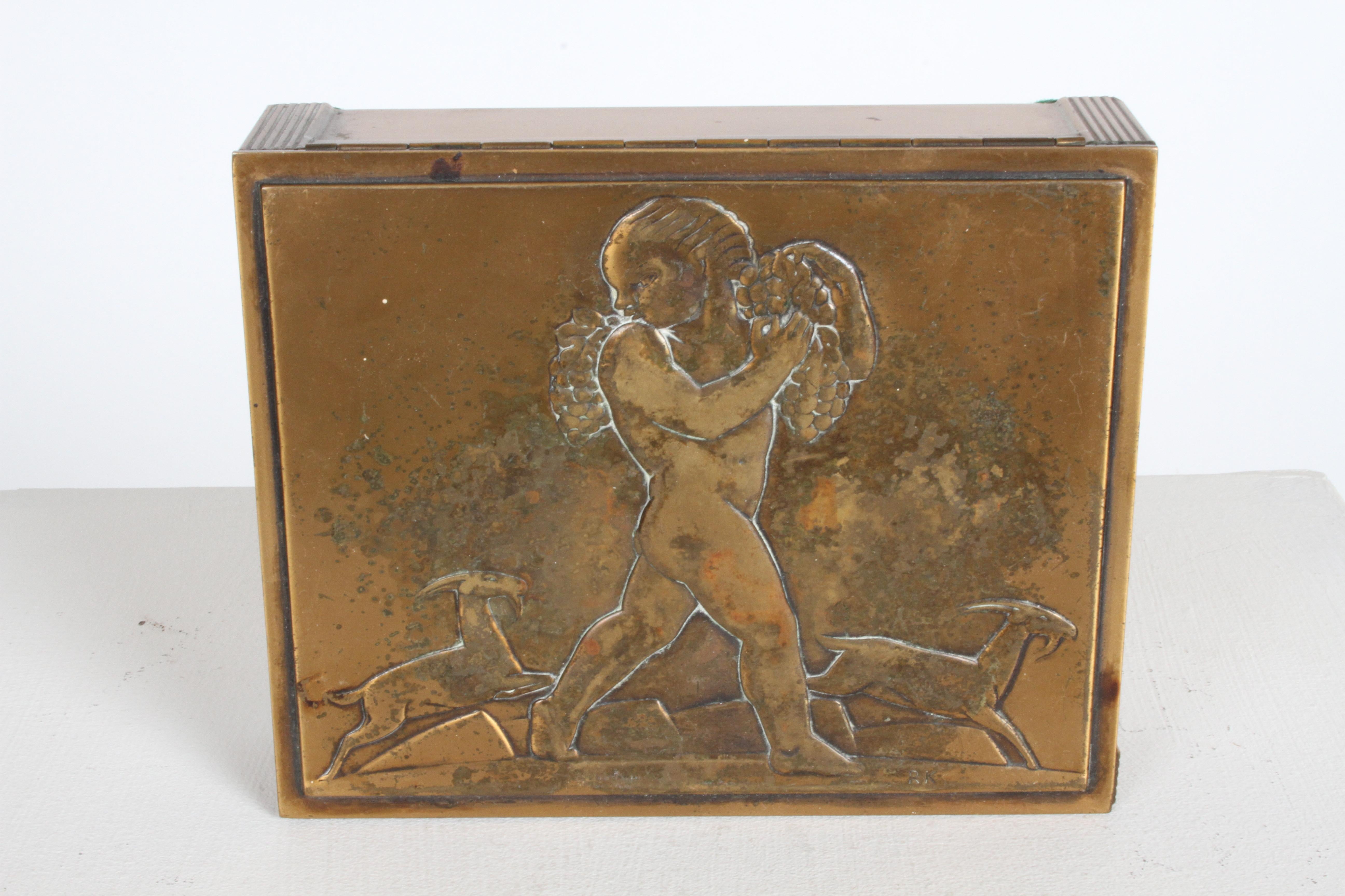 Rockwell Kent (American, 1882-1971) Rare Bacchus Art Deco copper cigarette box for Chase Chrome & Brass company, only offered in 1935 and 1936. 

Rockwell Kent designed only three items for chase, all with the same young Bacchus motiff, and all