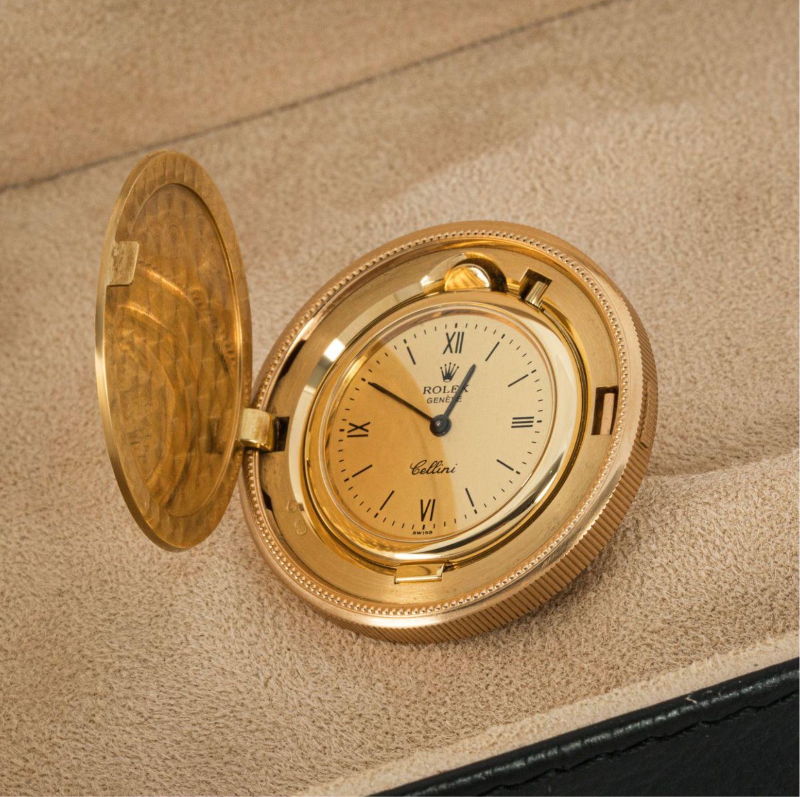 A Rare, Rolex Cellini Twenty Dollar 24ct & 18ct yellow gold coin watch, C1995.

Dial: The original champagne dial with black Roman numerals, outer minute track and signed Rolex Genève Cellini.

Case: The rare Twenty Dollar coin in pristine condition