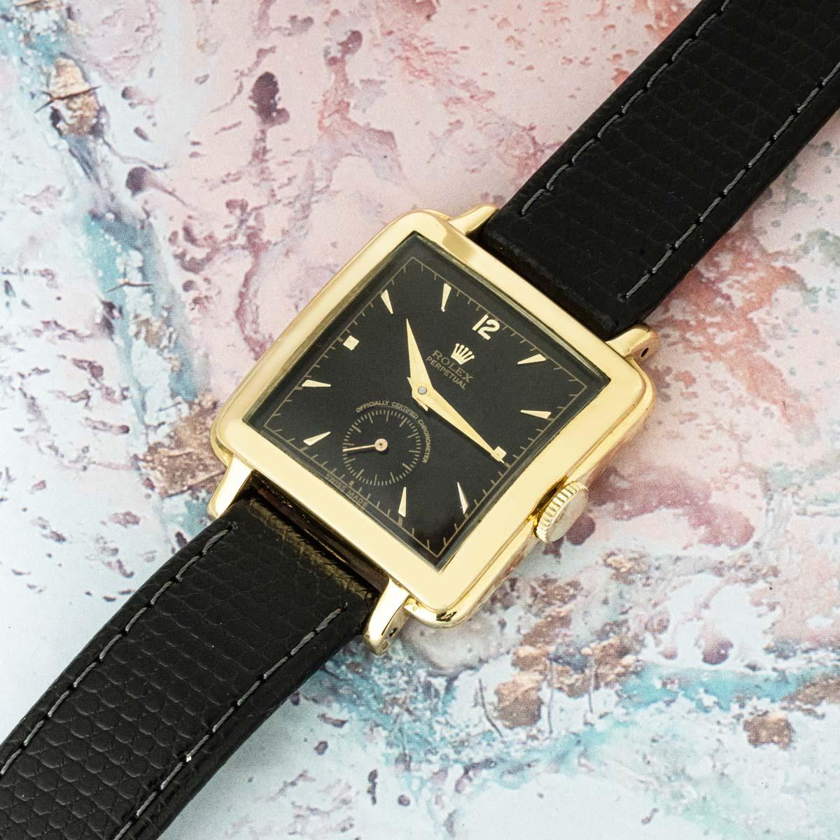 A rare vintage Rolex Perpetual Chronometer Officially Certified Ref. 4645 “Cioccolatone”, an exceptional example of Rolex’s post-war creativity. This striking timepiece features its original black dial with applied dagger style indices,
