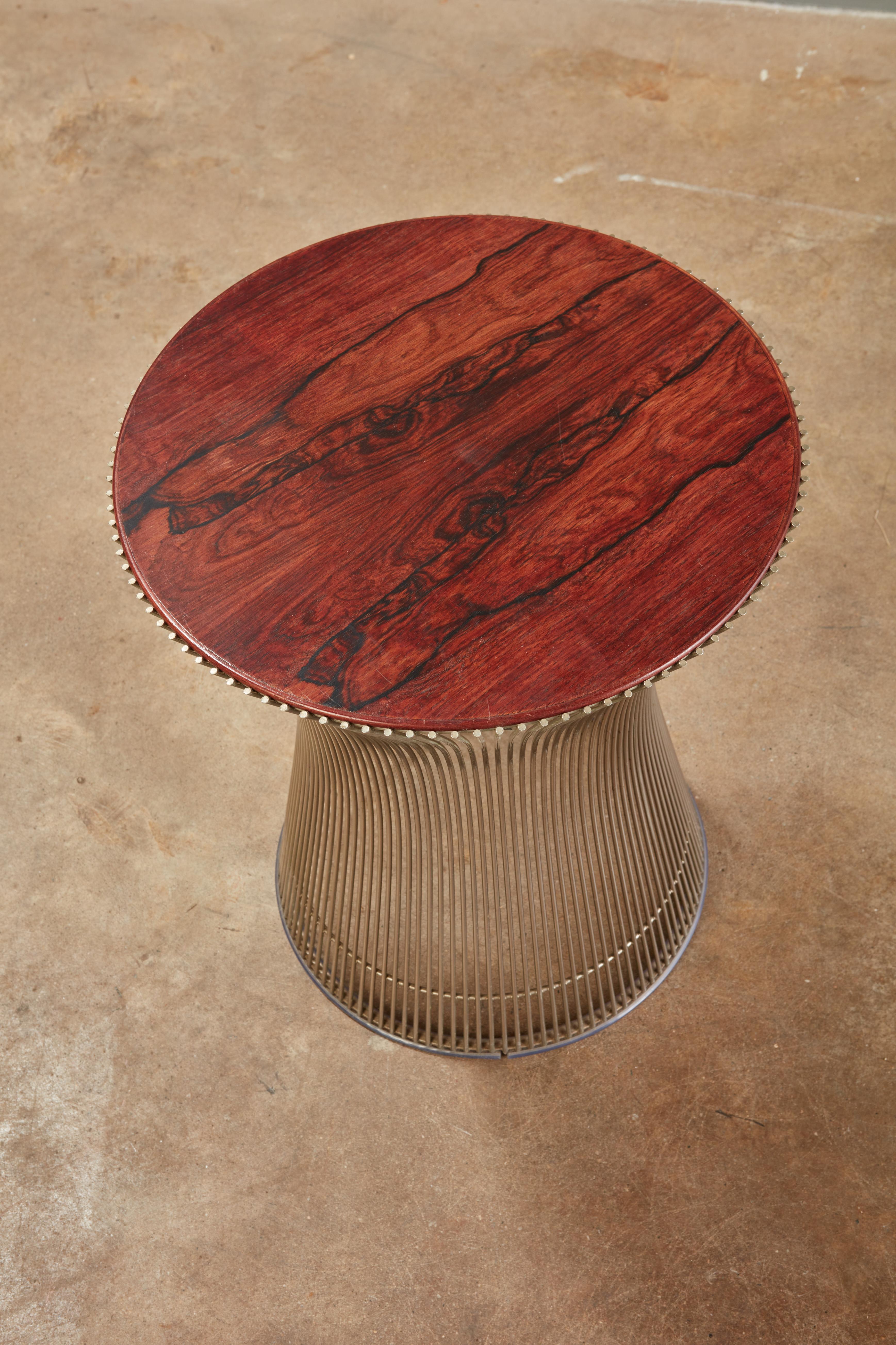 A very handsome rosewood and chrome side table by Warren Platner. The grain is particularly pretty on this original top, and has not been refinished.

This table came from the estate of the Director of the Boston Knoll showroom in the 1960s/70s.