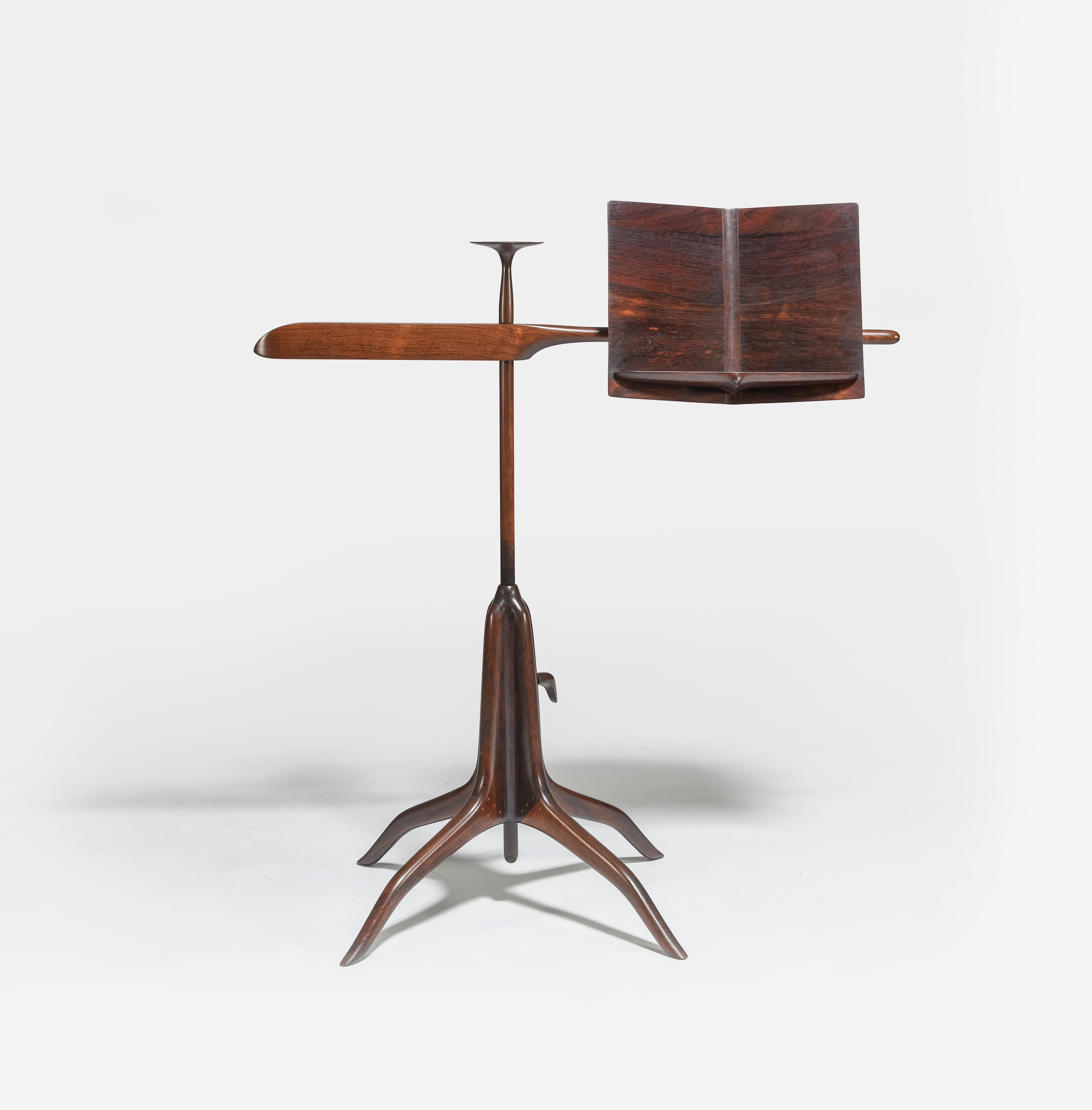 Exceptionally rare, and possibly unique, music stand by noted Californian craftsman Sam Maloof. Exquisitely crafted in East Indian rosewood. Fully adjustable and very finely detailed. Circa 1970s. A fine example of California Design. Excellent
