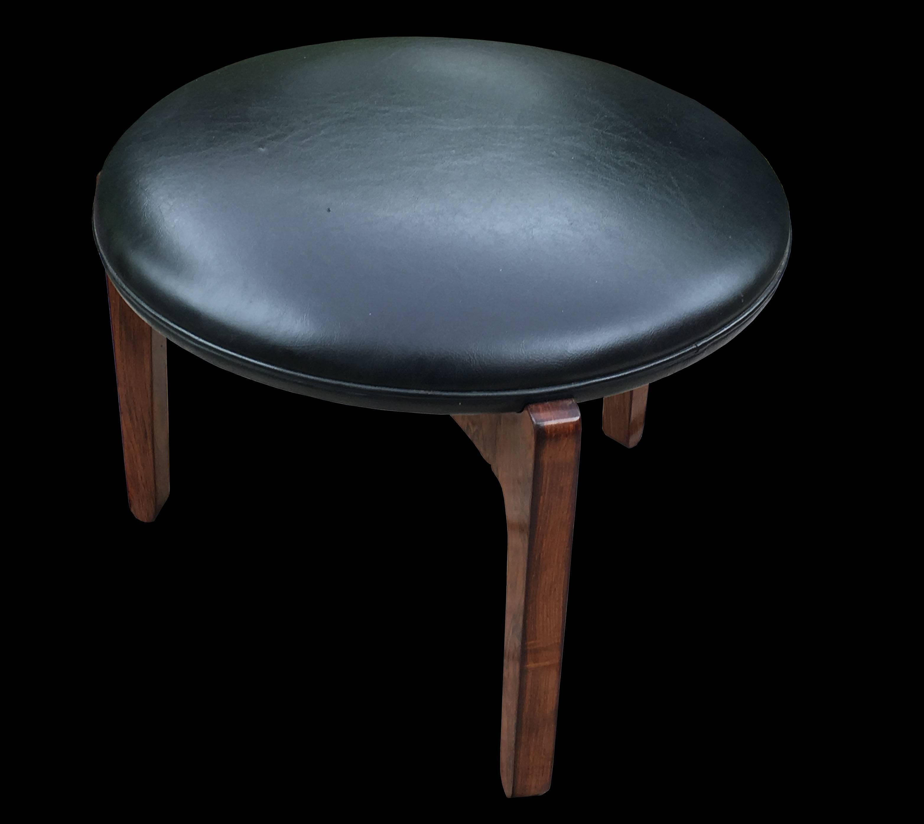 A very clean example of this scarce stool designed by Sven Ellekaer and made from very nice rosewood and black leather cloth.