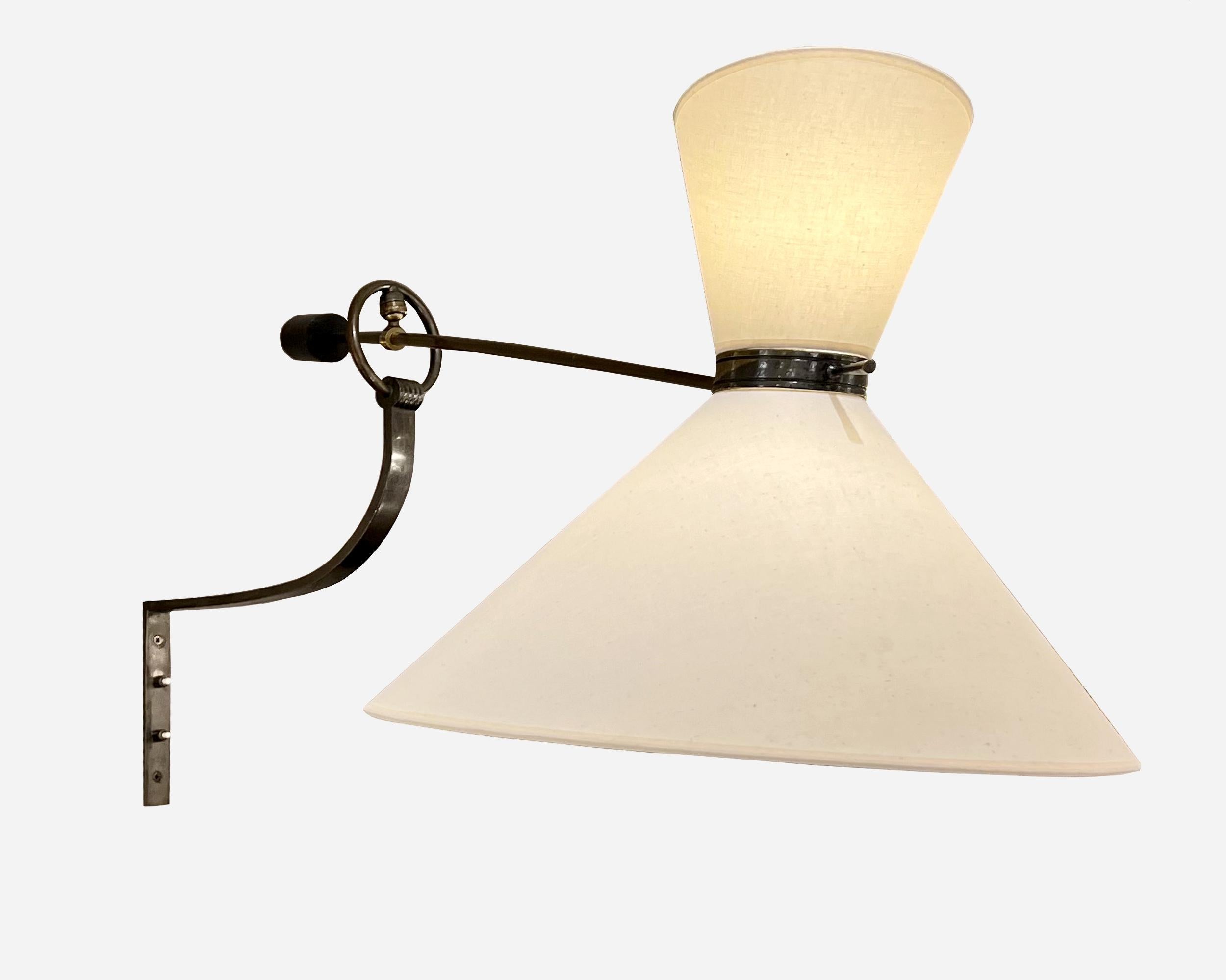 French Rare rotating wall lamp by Maison Lunel, France 1950 For Sale