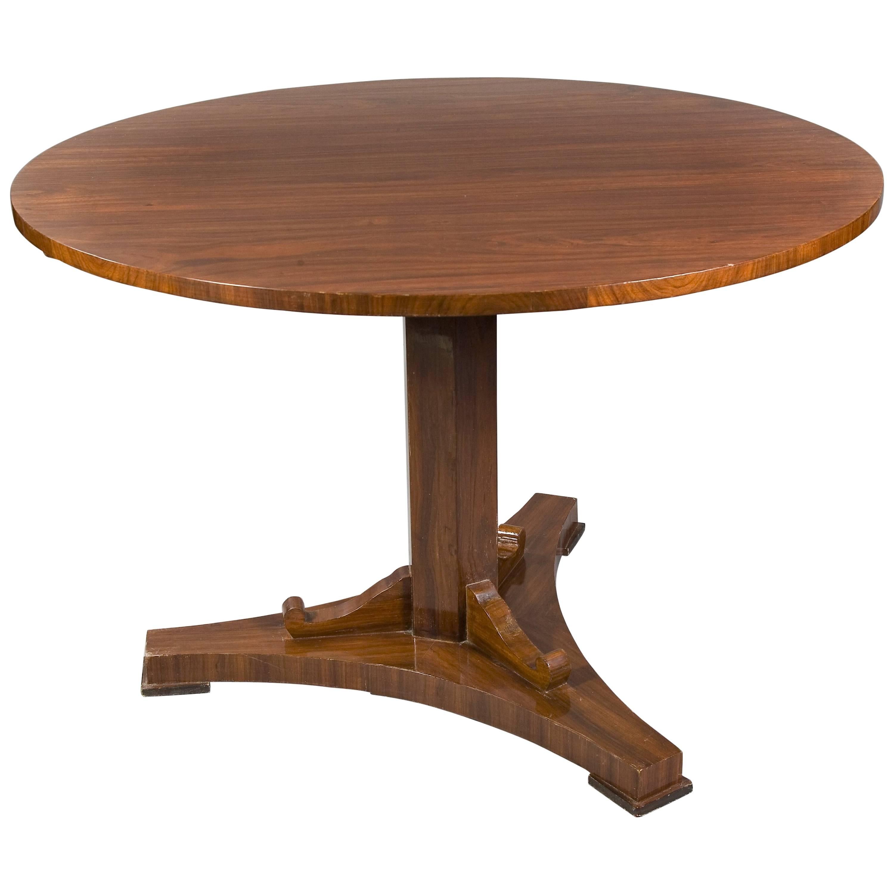 Rare table pliante ronde en placage d'acajou de style Biedermeier