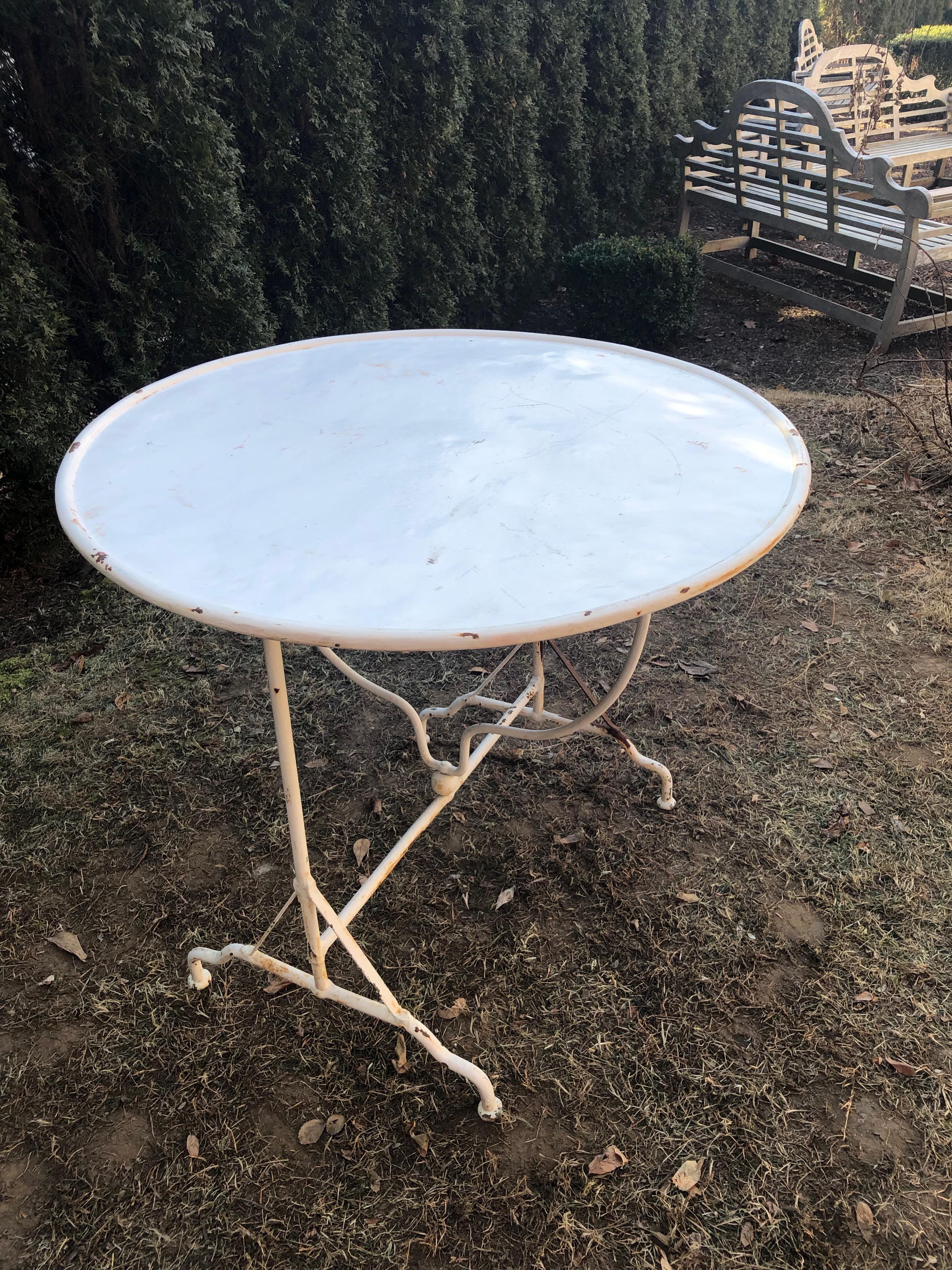 We love wine-tasting tables, but actually have never seen one in iron. From Lyon, the culinary capital of France, this beauty is the perfect space-saving table, indoors or out, and was likely used for mixing or sampling wines. It would make a great