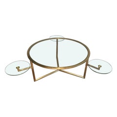 Rare table basse ronde dorée avec étagères rondes amovibles en verre