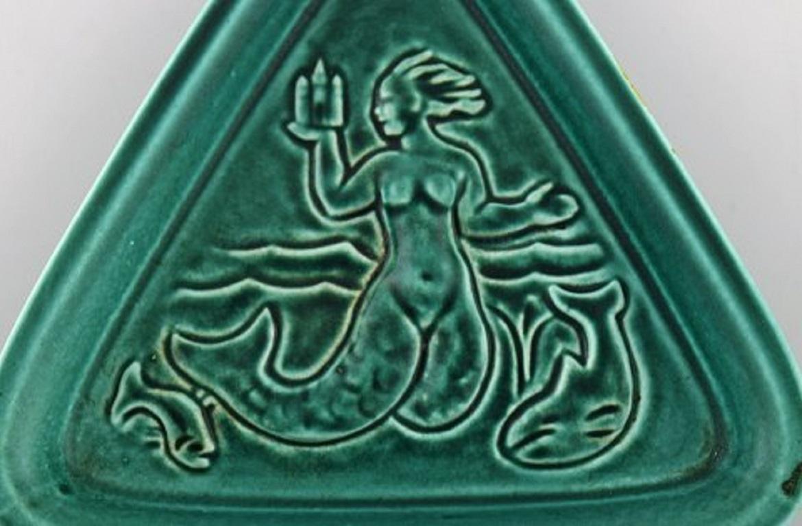 Rare Royal Copenhagen fragment in glazed ceramics after Knud Kyhn made for Illum's department store in Copenhagen. Decorated with a mermaid, circa 1970.
Measures: 13 x 2 cm.
In very good condition.
Stamped.
 