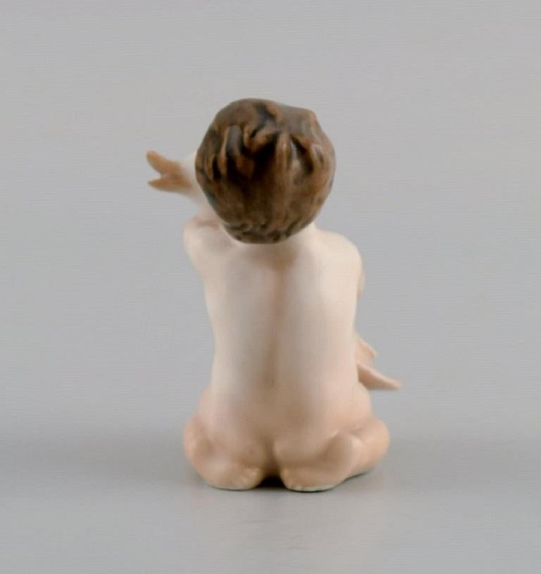 Glazed Rare Royal Copenhagen Porcelain Figure, Girl with Duck, Model Number 2332 For Sale