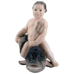 Rare Royal Copenhagen Porcelain Figurine, Boy Sitting on a Fish, 1920s