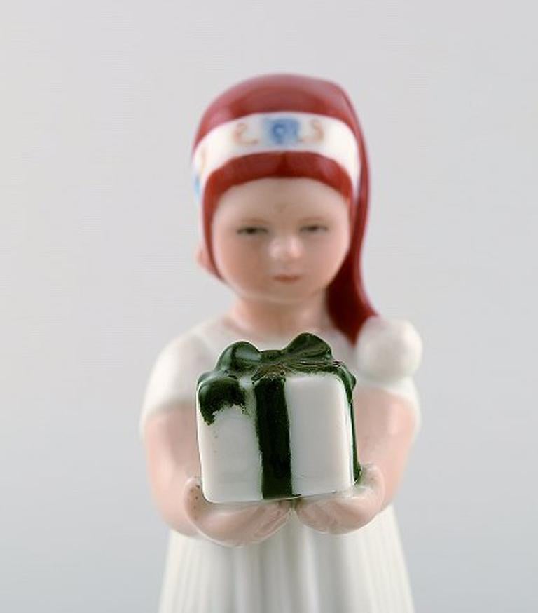 20th Century Rare Royal Copenhagen Porcelain Figurine, Girl with Christmas Present