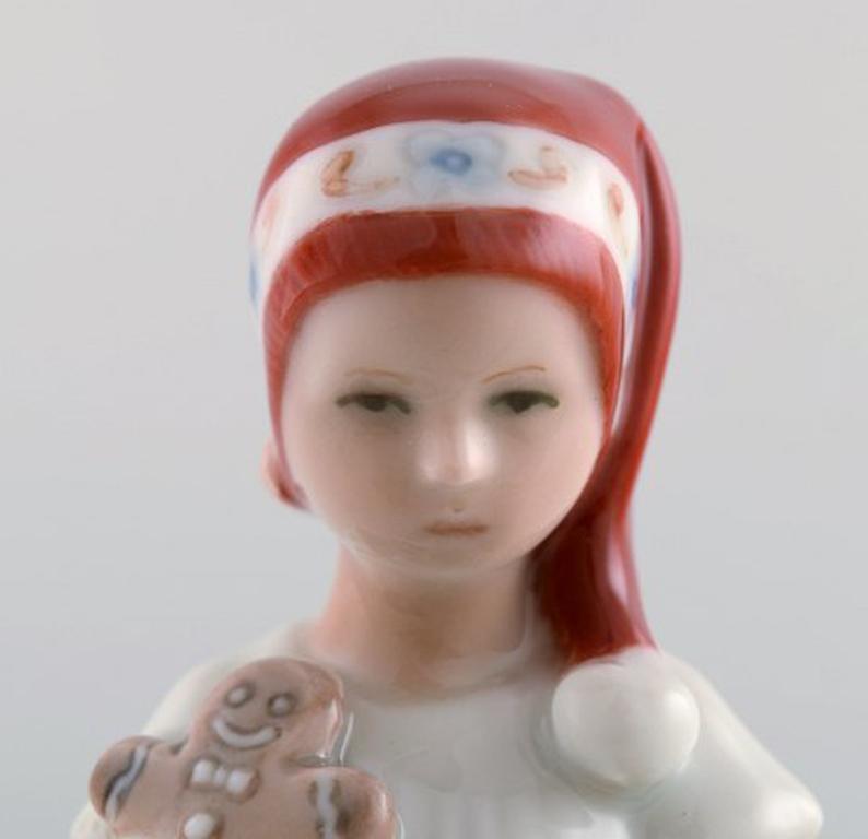 Rare Royal Copenhagen Porcelain Figurine, Girl with Christmas Stocking 1