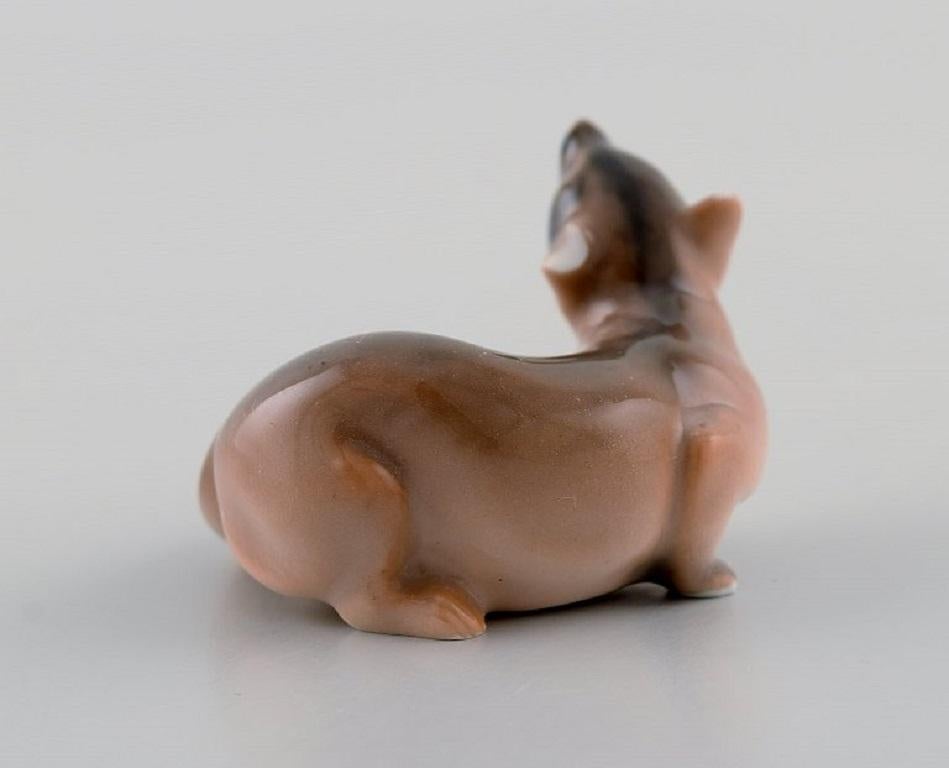Rare Royal Copenhagen porcelain figurine. Marten.
Model number 2334. Early 20th century.
Measures: 4.4 x 3.3 cm.
One ear is chipped.
Stamped.
1st Factory quality.
