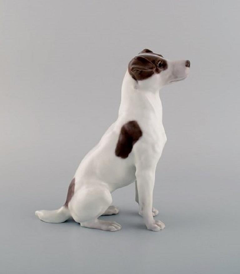 Rare Royal Copenhagen porcelain figurine. Terrier. Model number 1452/753. 
Measures: 22.5 x 19 cm.
In excellent condition.
Stamped.
1st factory quality.
  