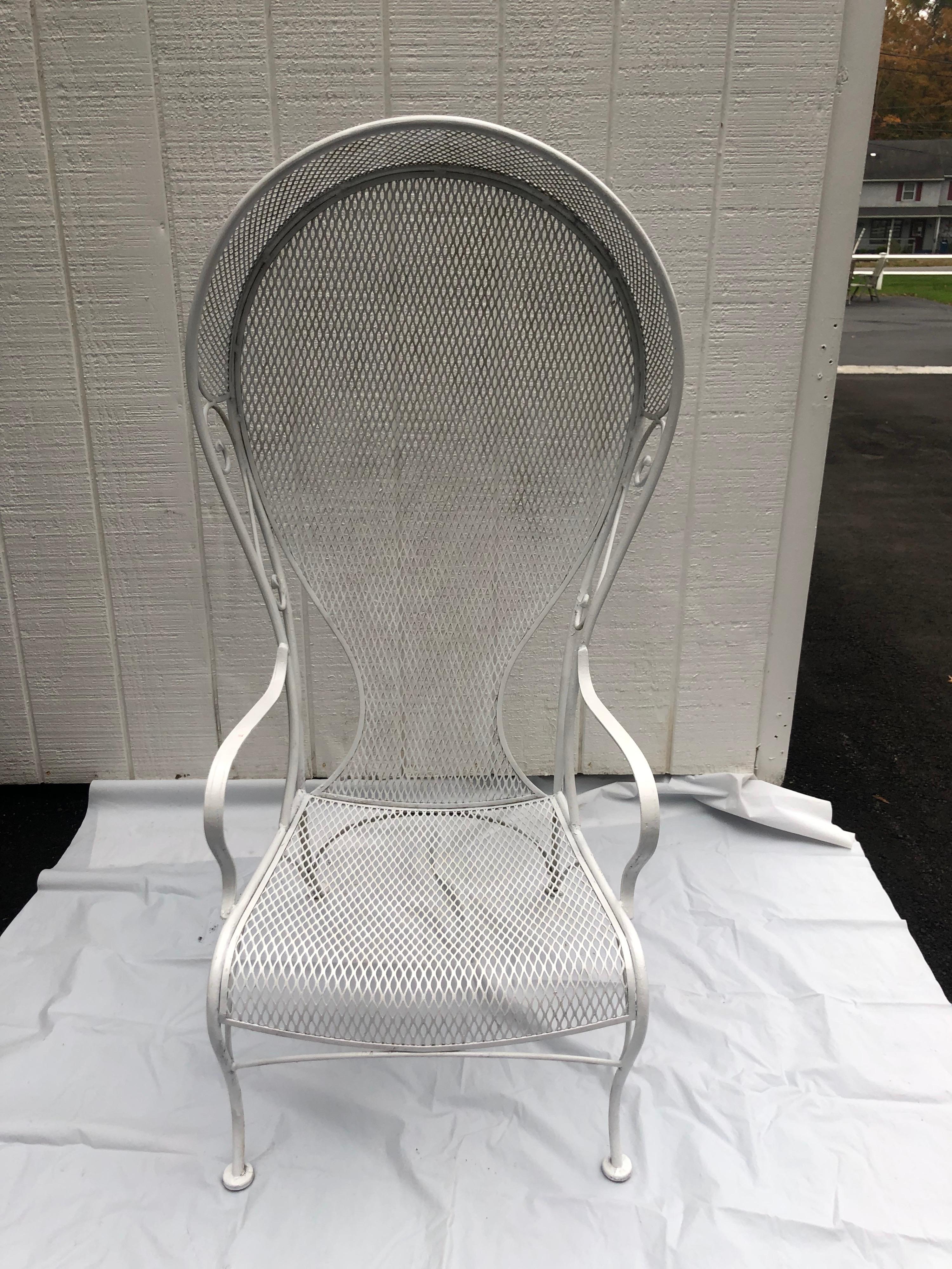 Rare Russell Woodard white iron Canopy chair. Perfect for that Palm Beach or Miami poolside seating. 
Or be dramatic and use it indoors. Classic and timeless Hollywood Regency Dorothy Draper style. 
Measures: Height: 56 in. 
Width: 28 in.
Depth: