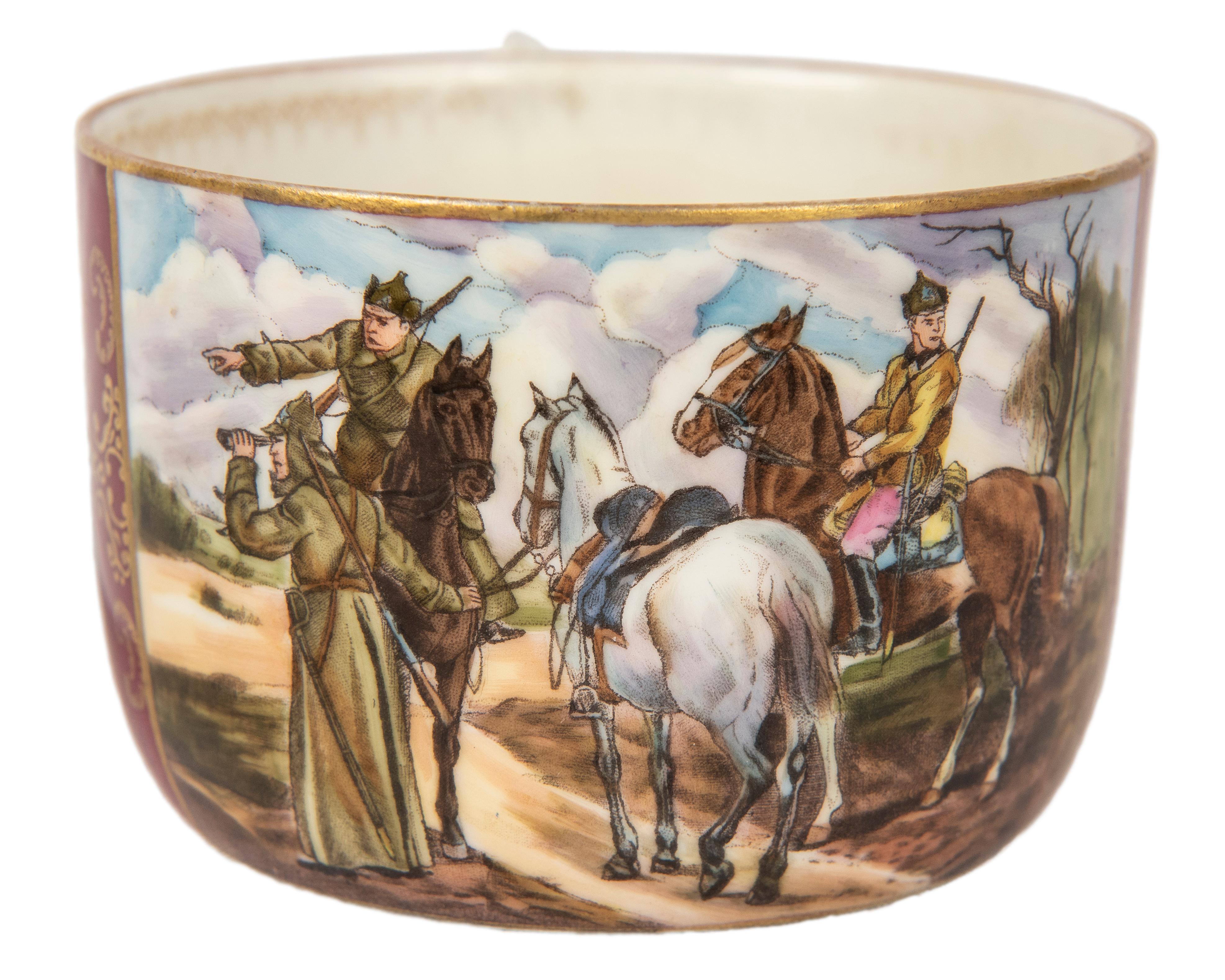 Painted between 1935 and 1946 by the Dimitrov Factory near Moscow, the rare porcelain cup and saucer commemorates the Russian Civil War of 1918-21. Of high quality with crisp detail and vivid color, the front of cup depicts a detailed scene of Red
