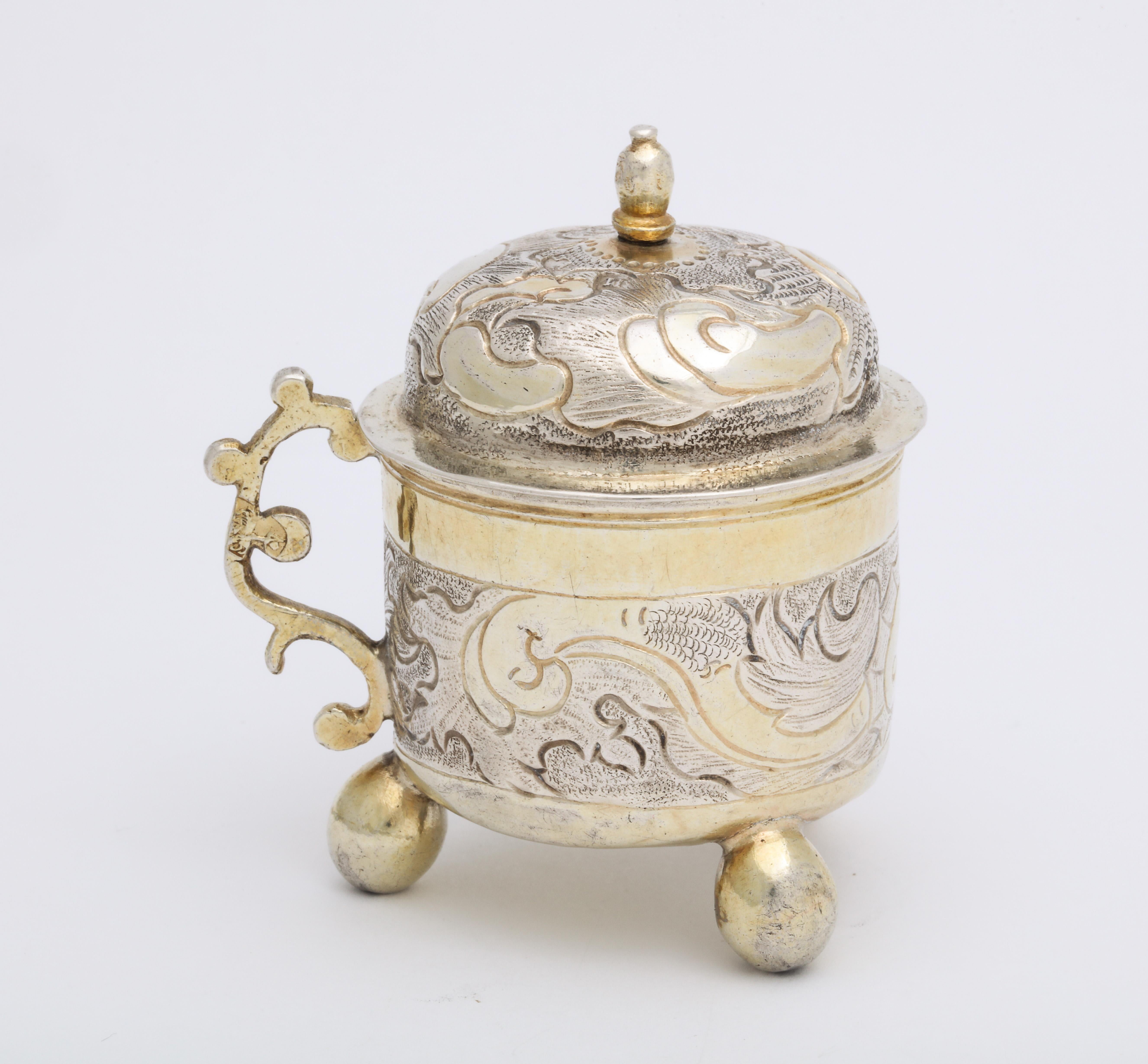 From the reign of Russian Empress Elizabeth Petrovna, the daughter of Peter the Great, this rare mid 18th century silver charka or drinking cup was made Grigorii Serebrianikov in the ancient capital of Moscow. The partially gilded cylindrical cup is